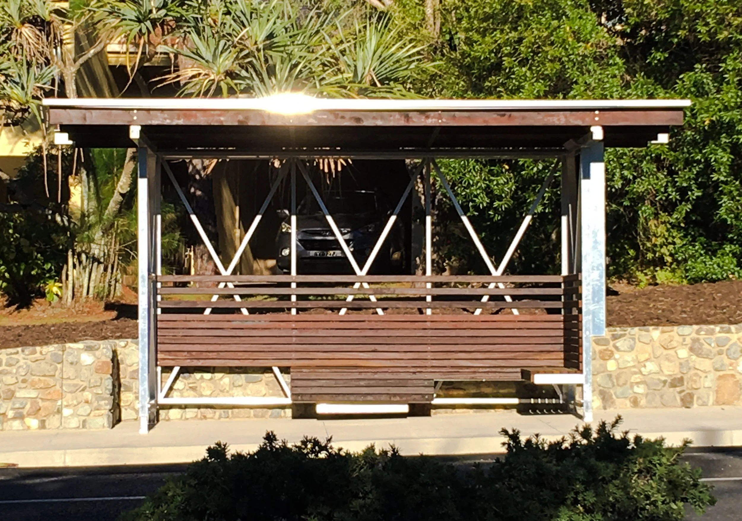  Mill finish aluminium framing and stained hardwood were selected as the main materials due to their cost, durability and timeless beauty. 