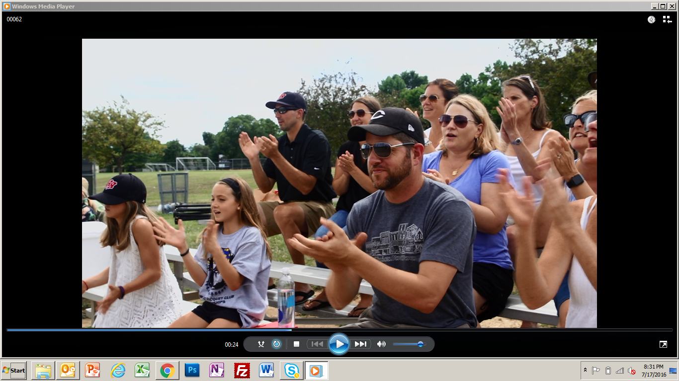 Crowd cheering on the team