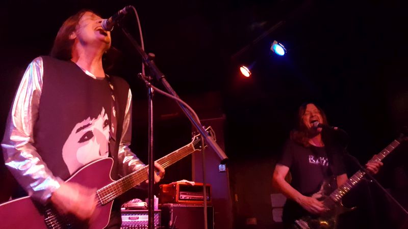 The McDonald brothers on stage at Ace Of Cups. Notice Steve McDonalds vintage Gibson bass guitar ala Gene Simmons 1975 and his shirt that reads "BASS" with Kiss double S's.