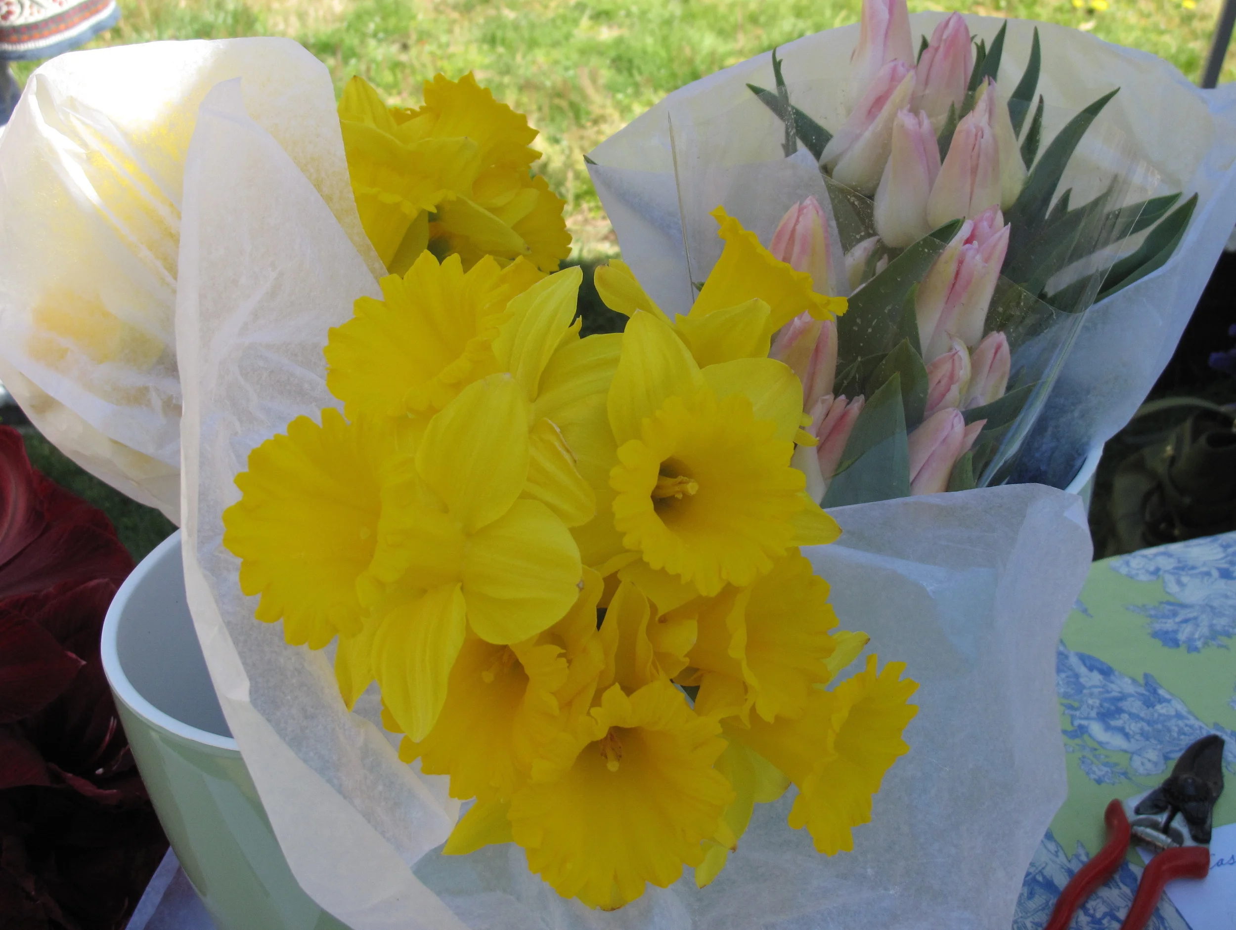 Daffodils and tulips in buckets.JPG