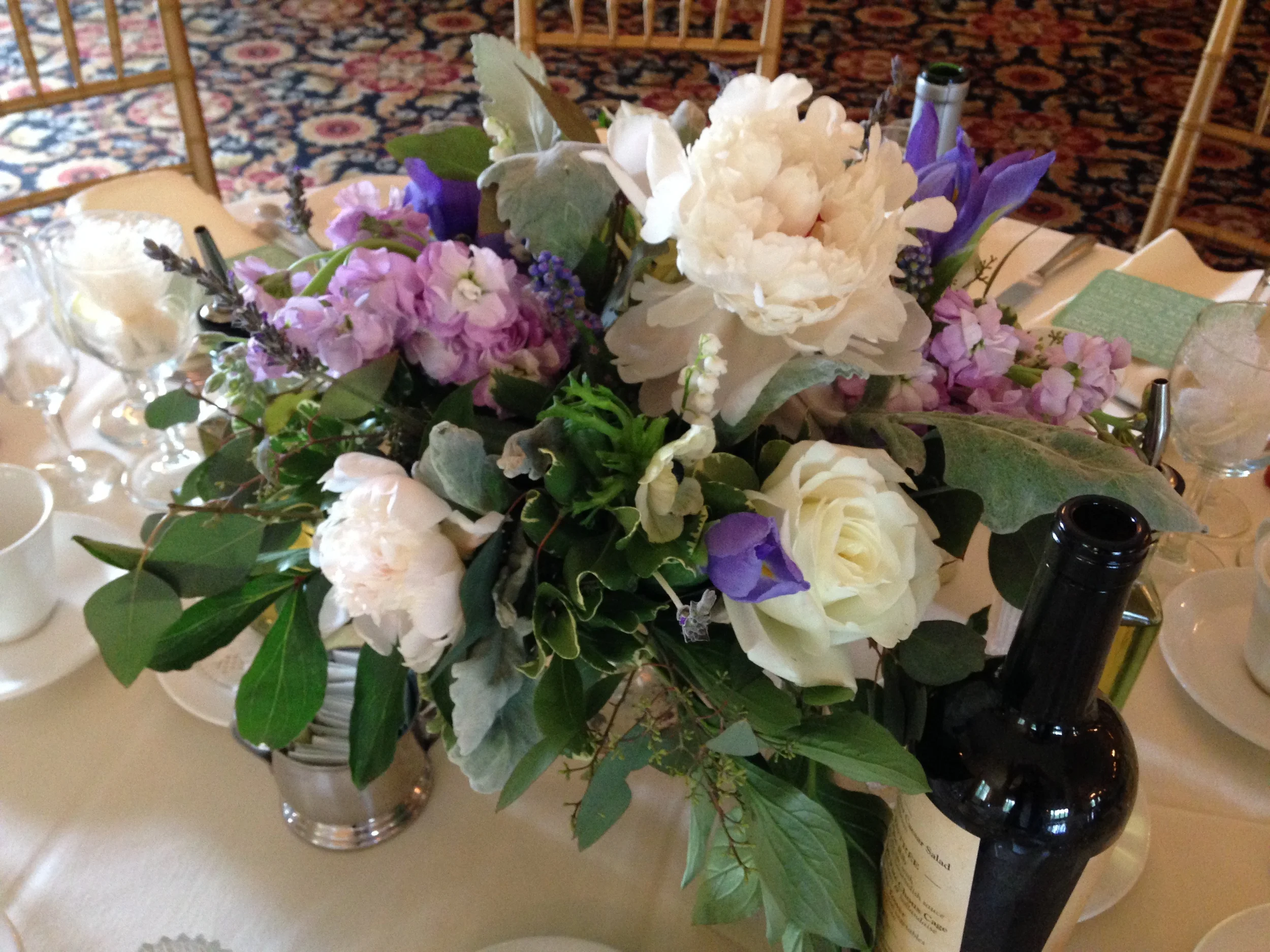 Centerpieces in mercury glass pedestal vases were spectacular to create.