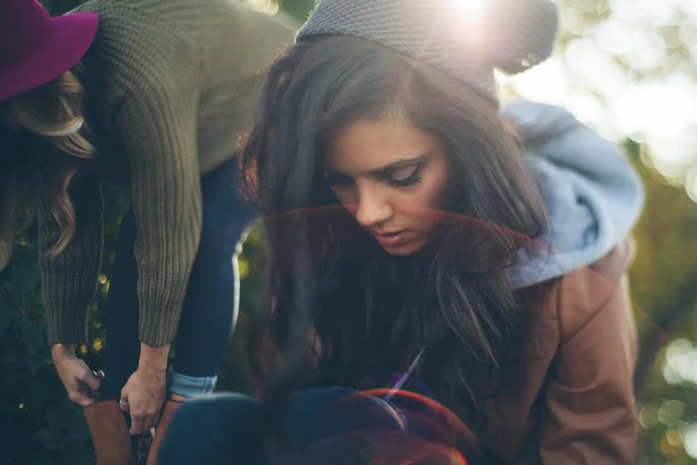 Another freelensed, candid shot, this time of Katie getting ready for another look. 