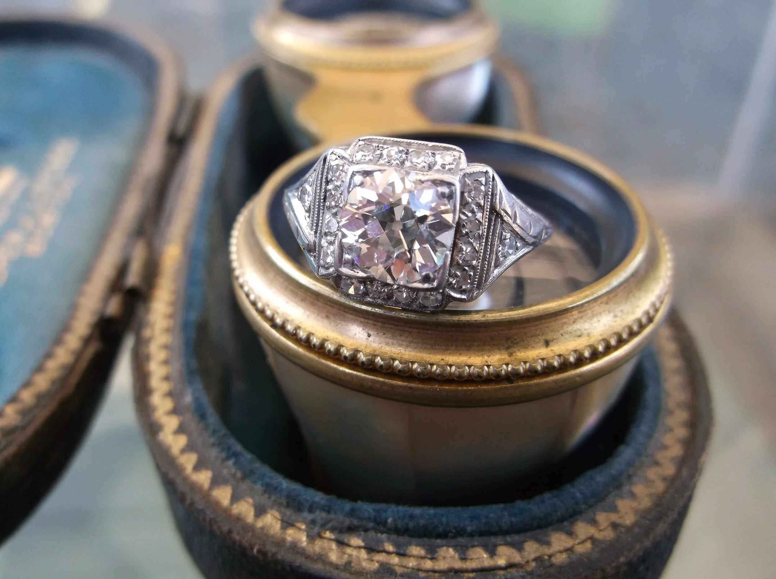 SOLD - Extraordinary 1920's 1.25 carat Old European cut diamond ring set in a platinum and diamond detail mounting.