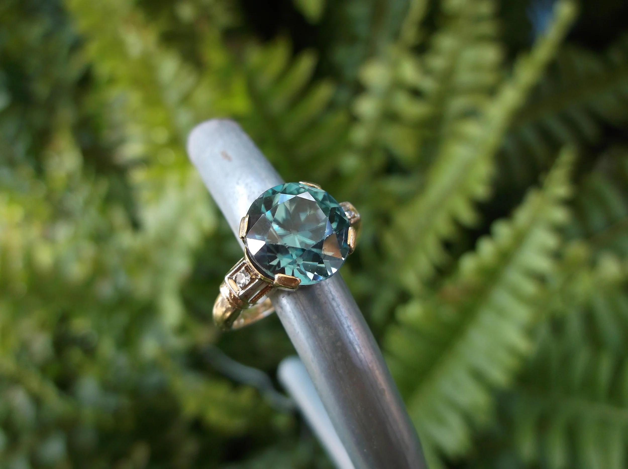 SOLD - Impressive 1940's Retro 4.50 carat blue zircon set in a rose gold and diamond setting!