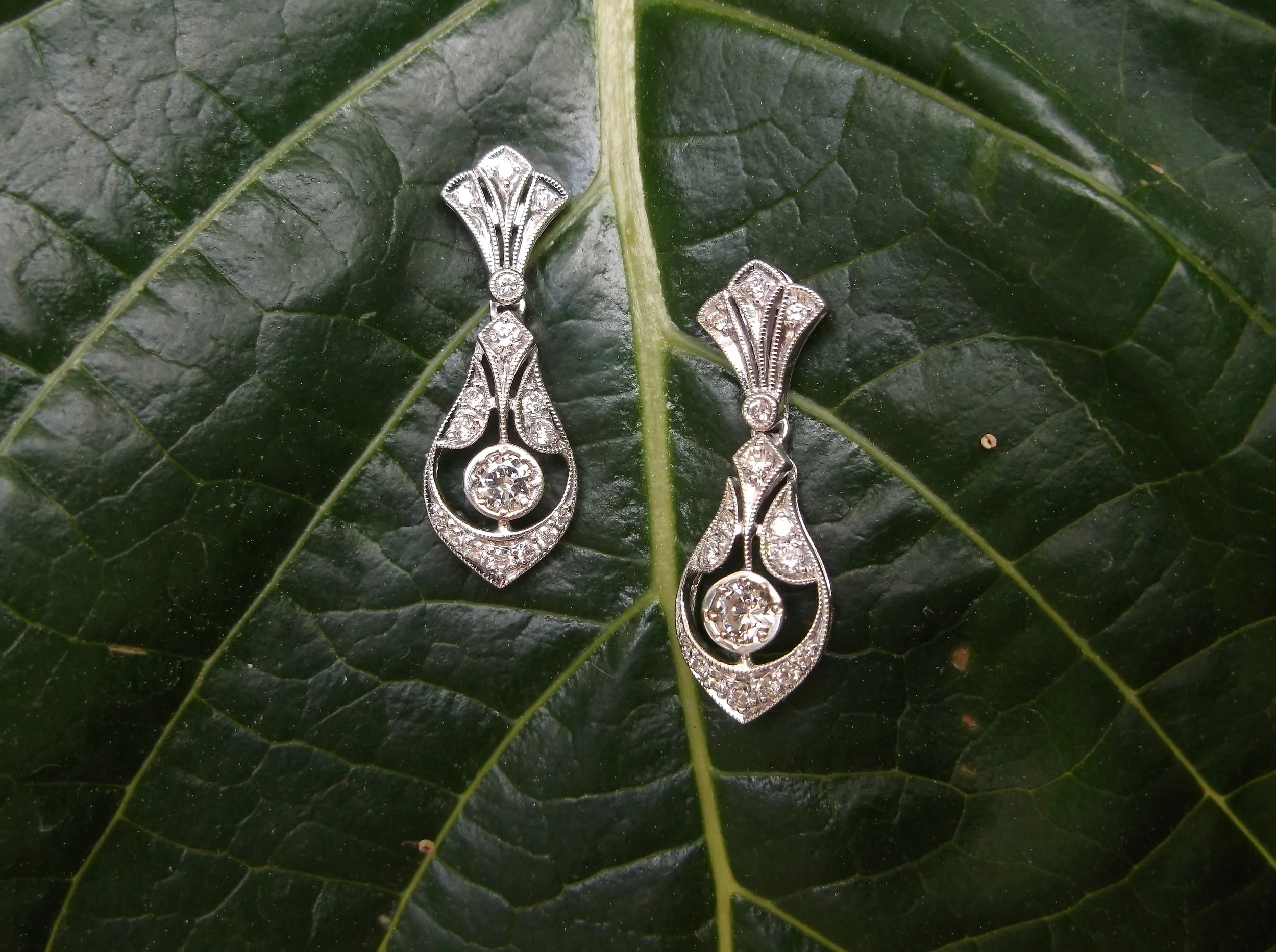 SOLD - Elegant diamond drop earrings with 0.54 carats total weight in diamonds set in white gold. 