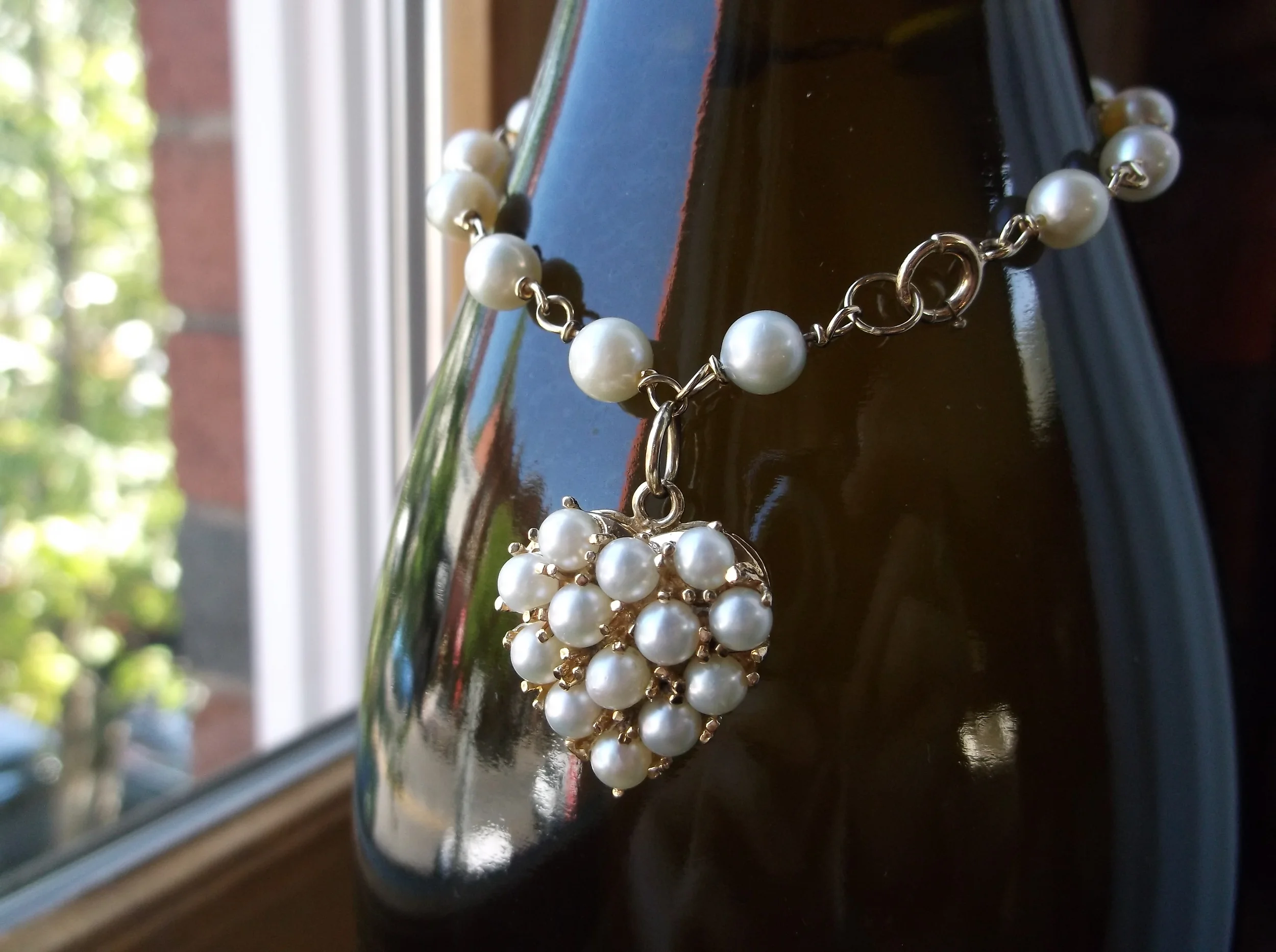 SOLD - The perfect gift for Mom! Yellow gold and pearl link bracelet with a sweet pearl heart.