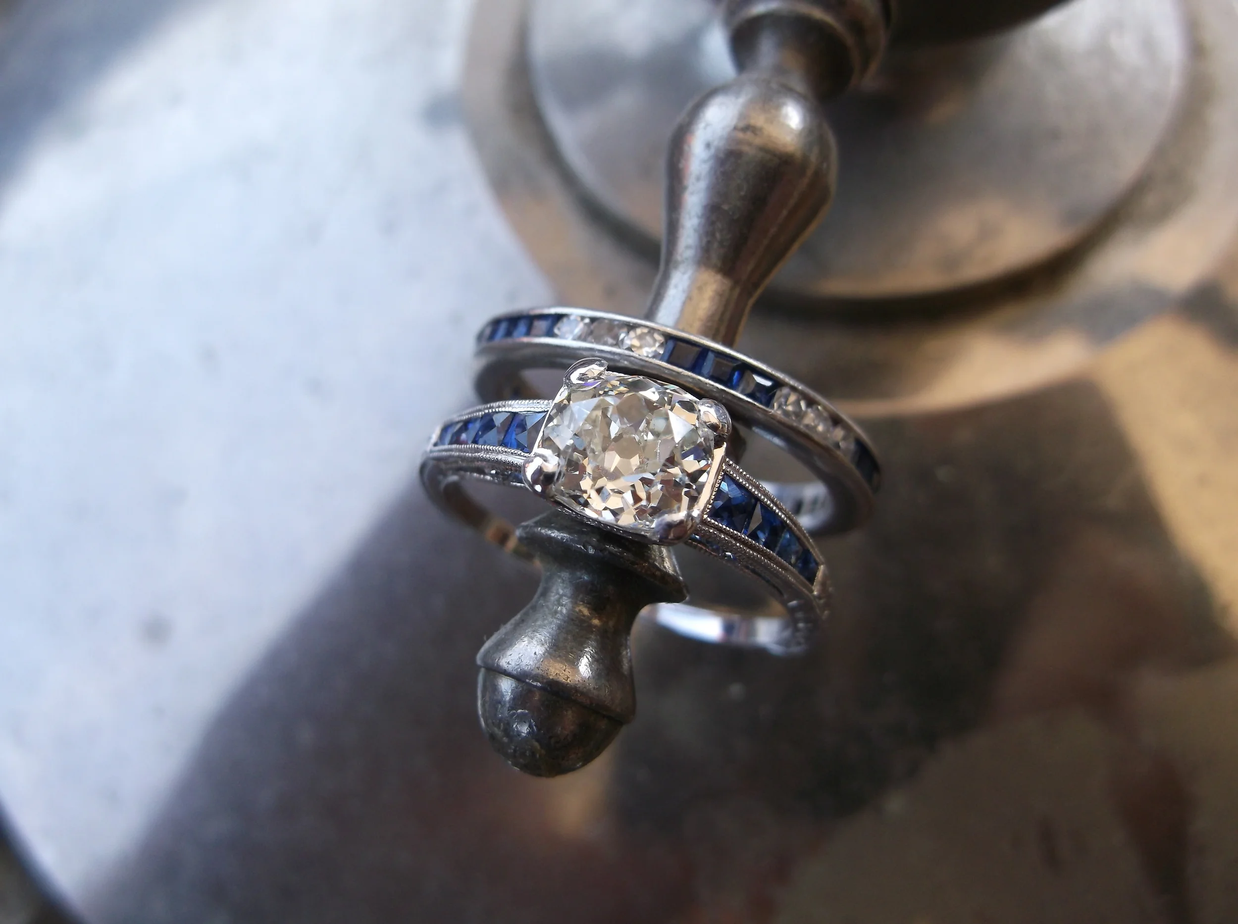 SOLD (band is still available) - Gorgeous 0.98 carat Old Mine cut diamond set in a beautiful sapphire and white gold setting. Pictured here paired with our diamond and sapphire eternity band. 