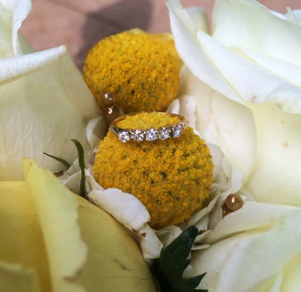 Emily's diamond and yellow gold Walton's band. 