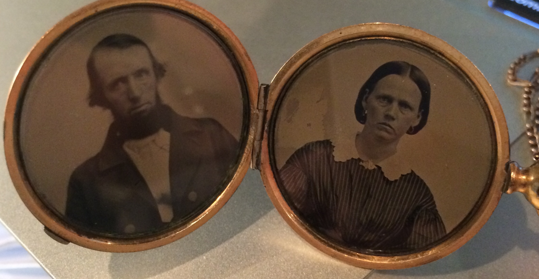 Victorian Era gold locket featuring pictures of great grand parents. 