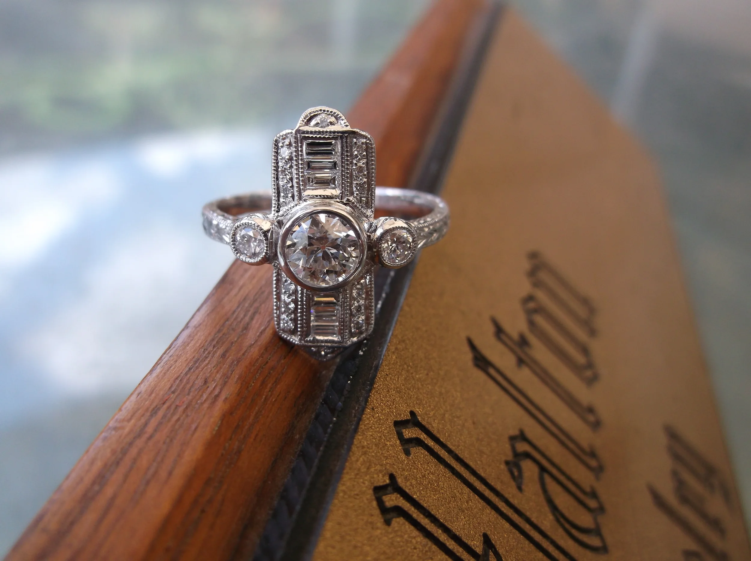 SOLD - Beautiful 0.44 carat Old European cut diamond (in the center) set in an Art Deco style diamond and white gold mounting. 