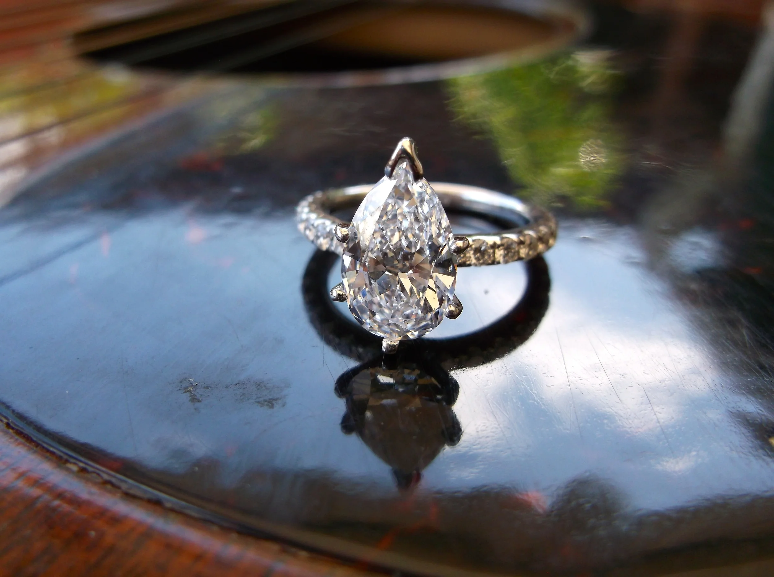 SOLD - Divine 2.04 carat pear shaped diamond set in a dainty diamond and white gold mounting. 