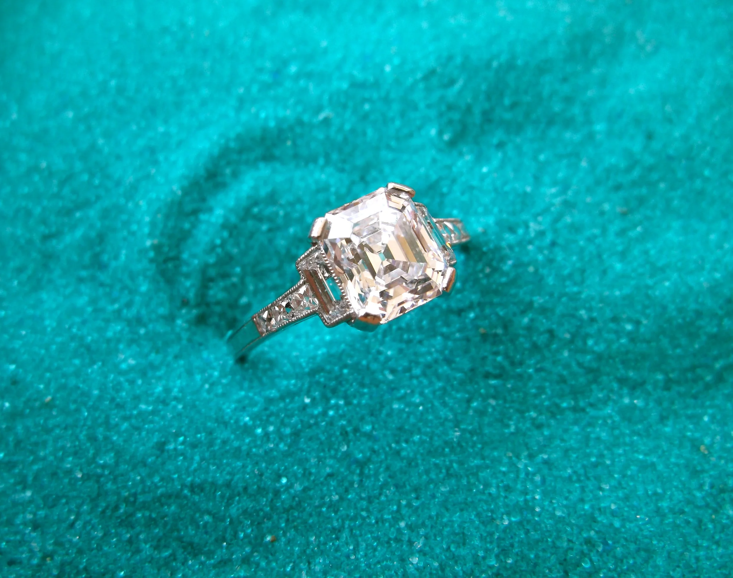 SOLD - Incredible Tiffany & Co. 1.67 carat, D color, asscher cut diamond set in a stunning Tiffany & Co. diamond and platinum mounting.