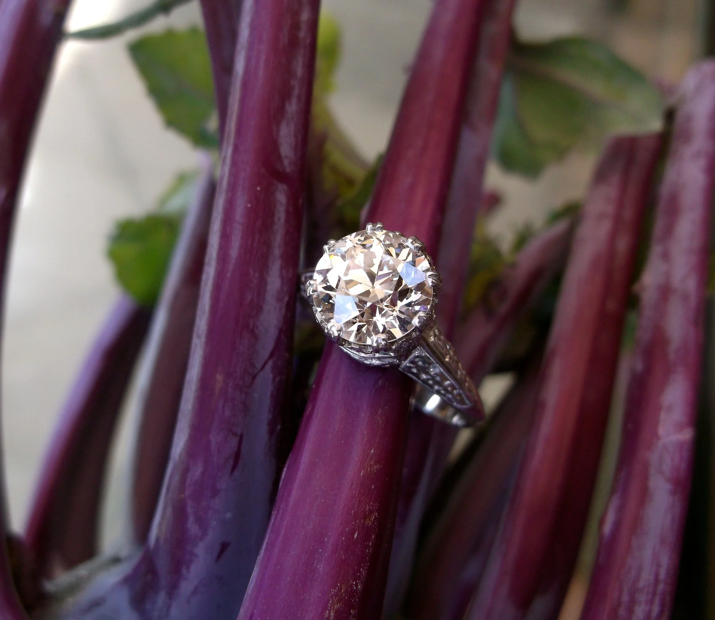 SOLD - Exquisite 1920's 2.11 carat Old European cut diamond set in a beautifully detailed platinum mounting. 