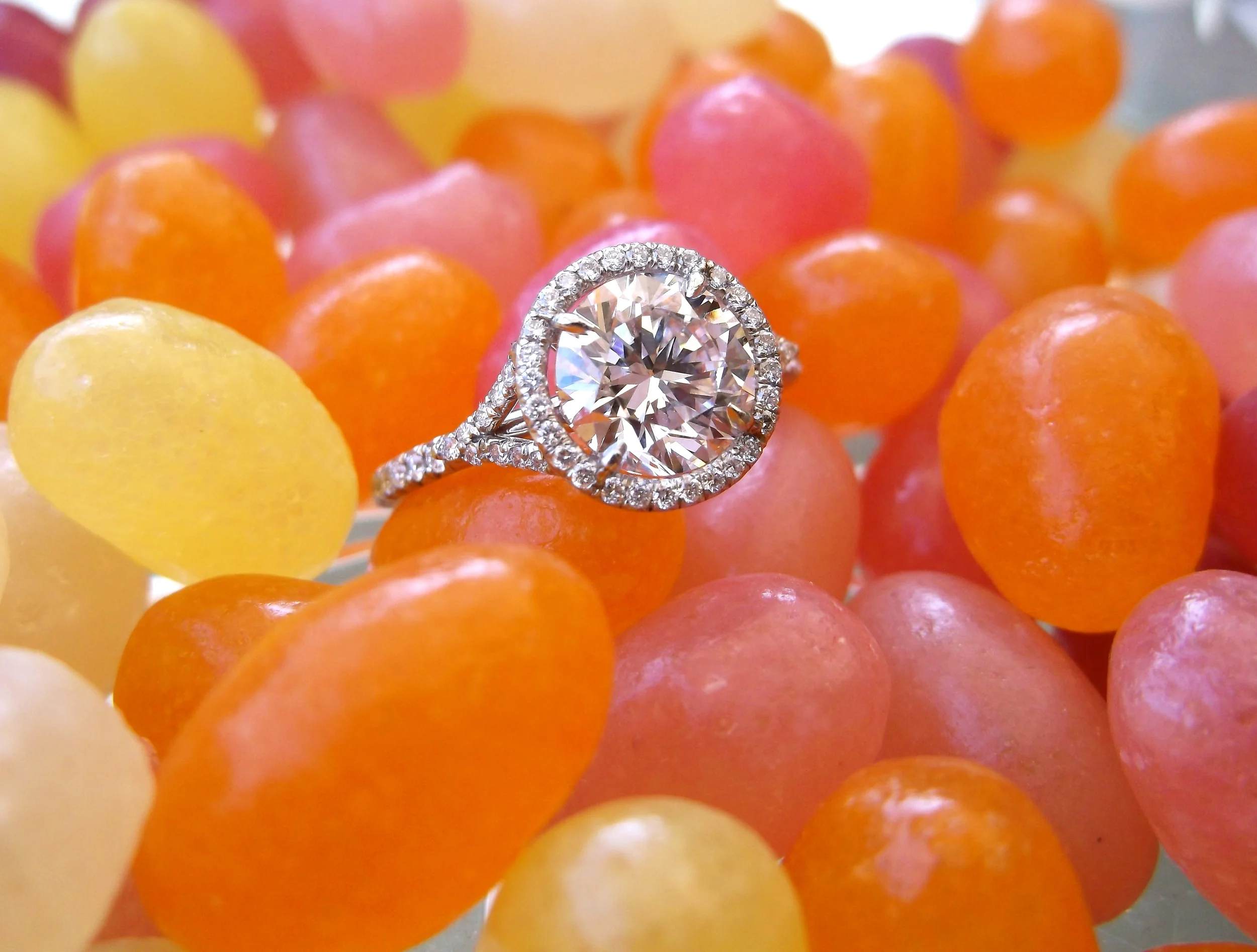 SOLD - Beautiful 1.51 carat round brillant diamond set lovely dainty diamond detail and platinum mounting.