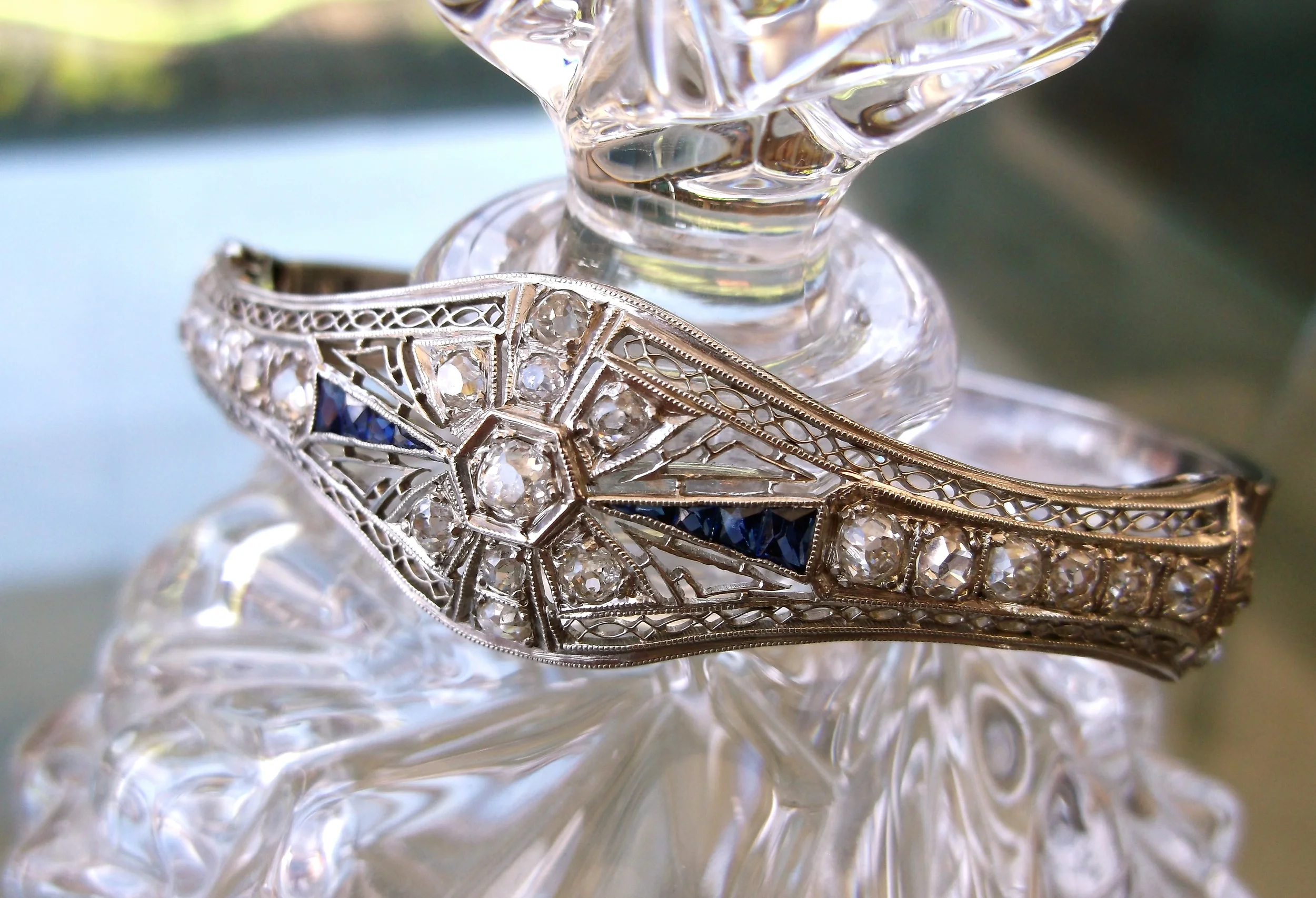 SOLD - Gorgeous Art Deco diamond and sapphire bangle bracelet set in white gold.