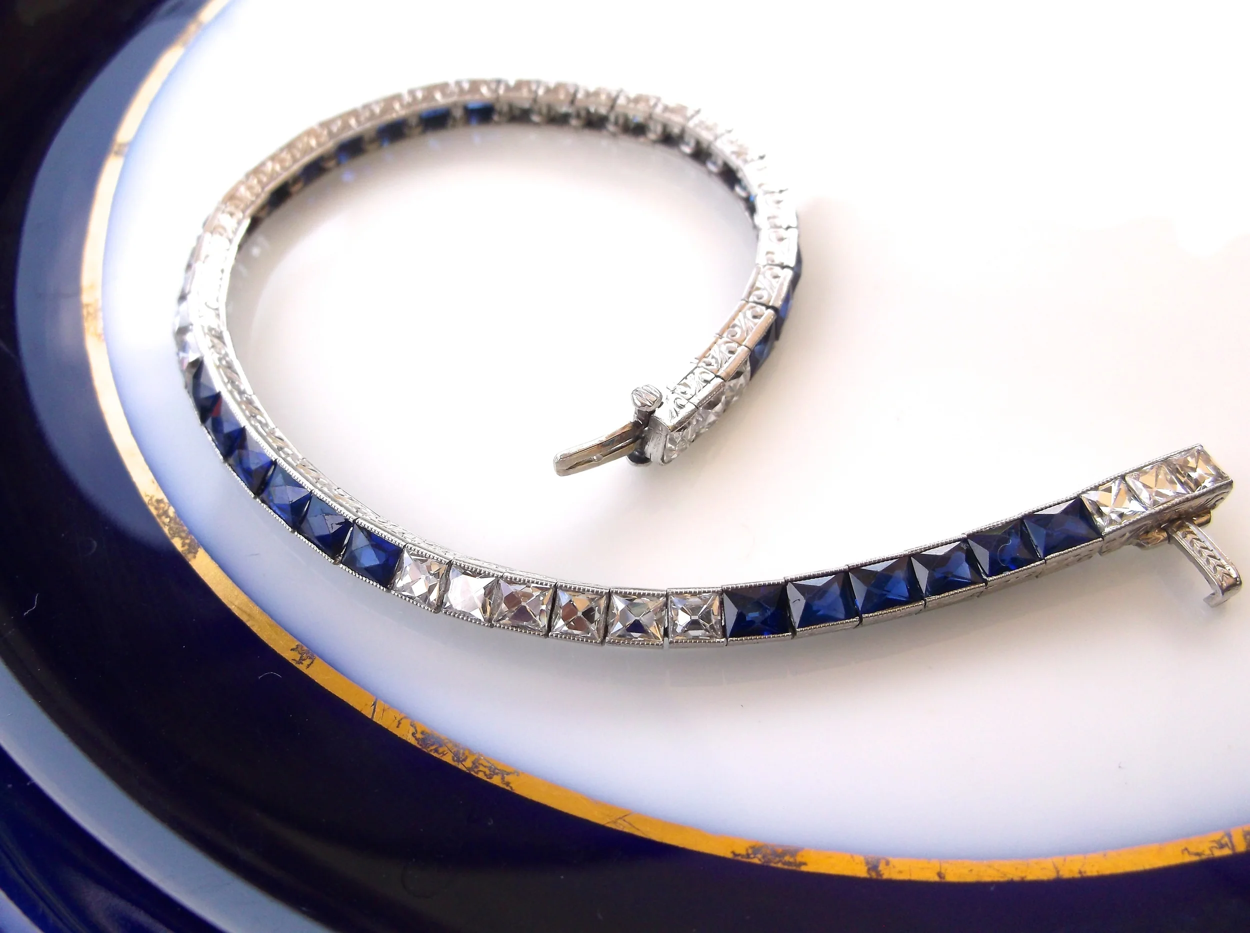 SOLD - Stunning 1920's swiss cut diamond and synthetic sapphire bracelet set in platinum with 3.60 carats total weight in diamonds.