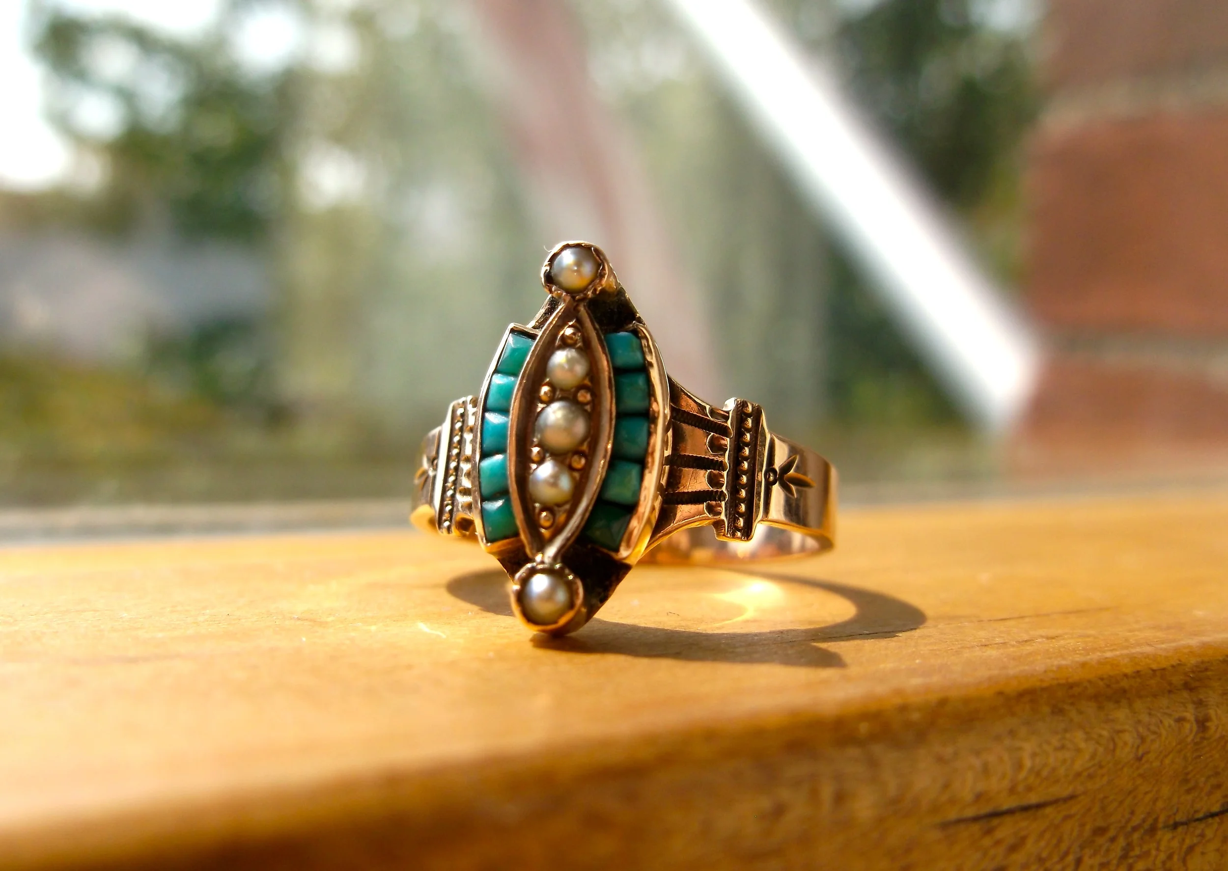 SOLD - Lovely Victorian Era turquoise and seed pearl ring set in yellow gold with beautiful hand engraved detail. 