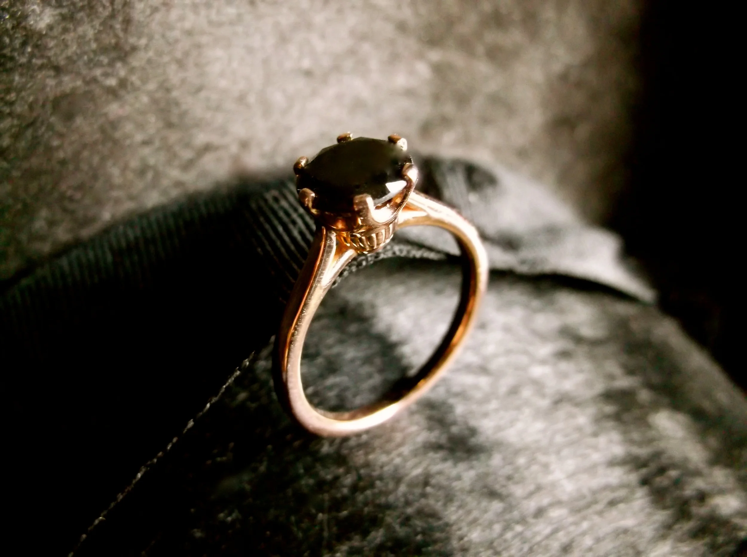 SOLD - A unique addition to our inventory! A 1.00 carat black diamond set in a six prong rose gold setting. 