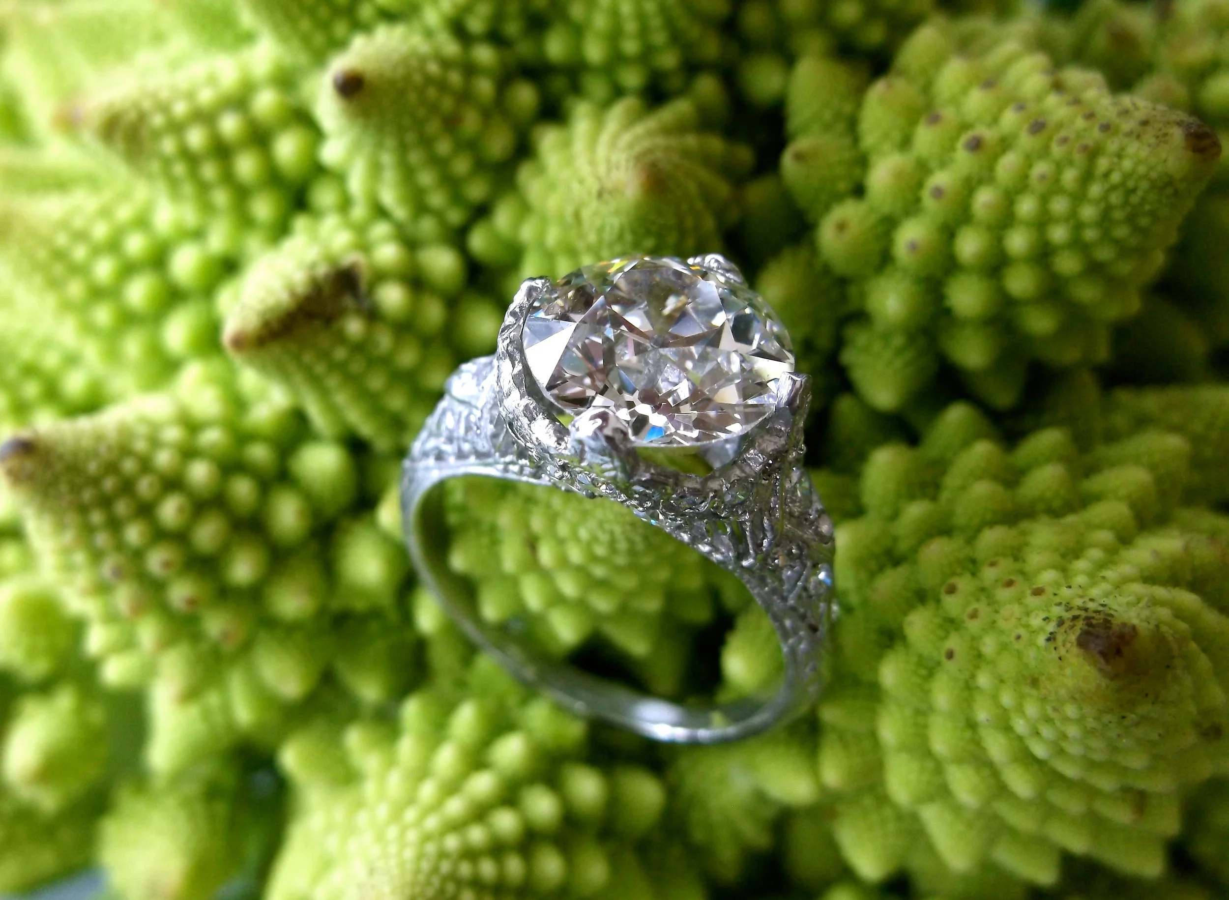 SOLD - Breathtaking 3.09 carat Old European cut diamond set in an Art Deco style platinum and diamond mounting.