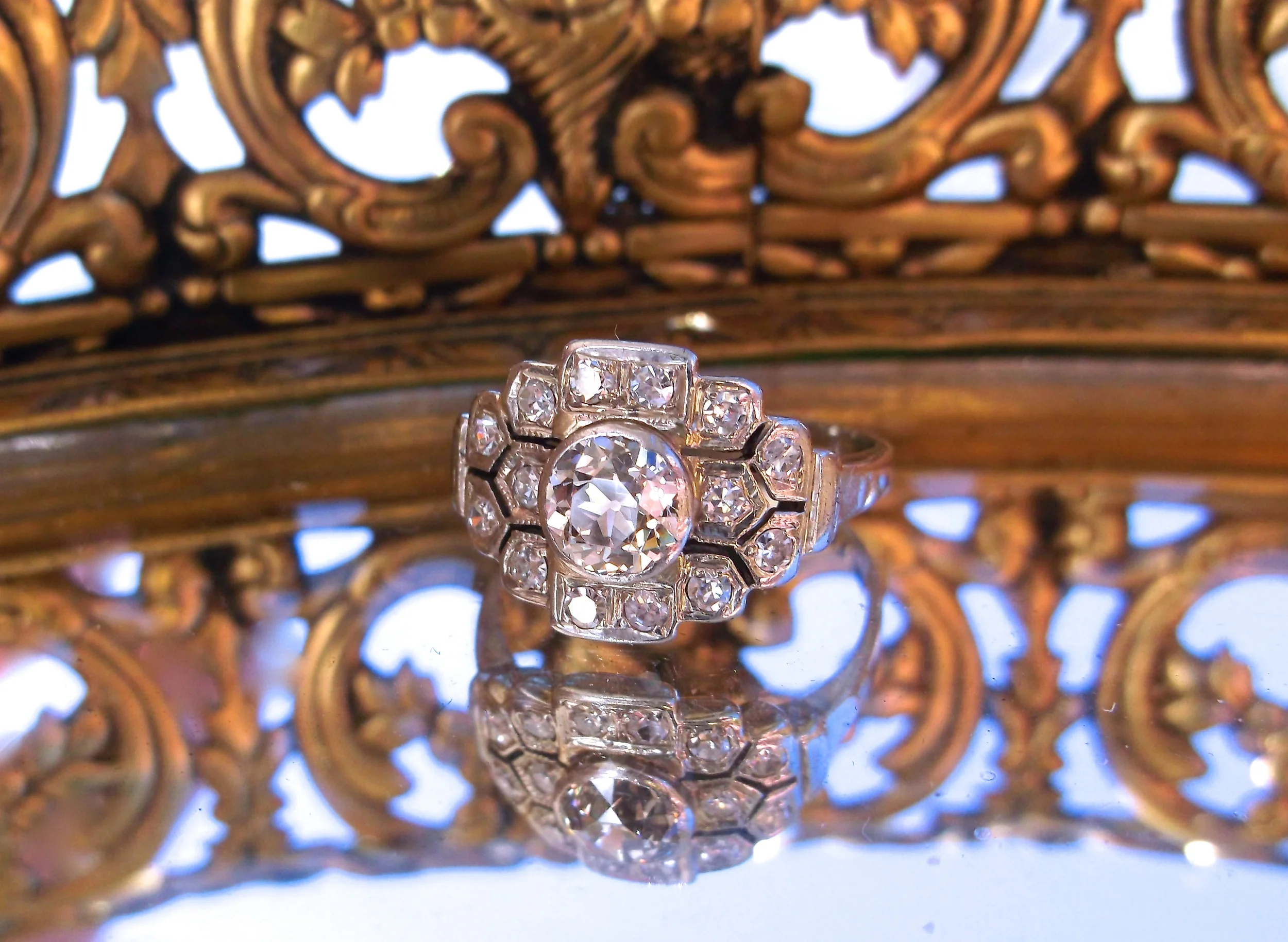 SOLD - Lovely Art Deco 0.42 carat Old European cut diamond set in a beautiful diamond and white gold setting.
