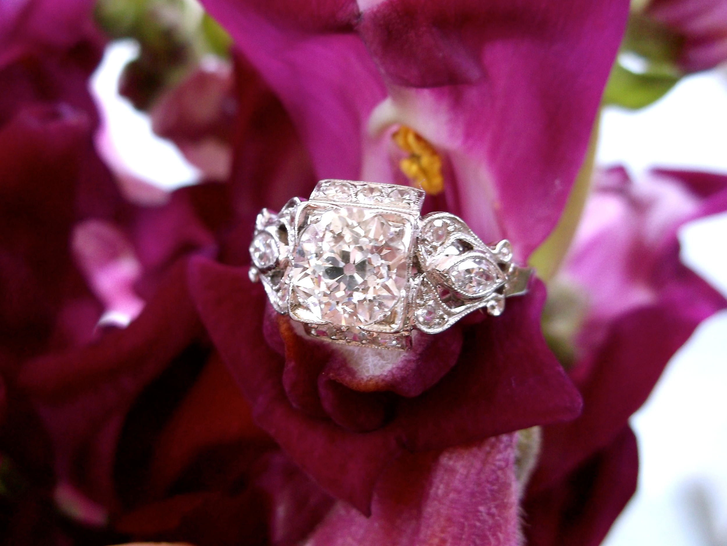 SOLD - Beautiful 1920's 1.02 carat Old European cut diamond set in a lovely platinum and diamond mounting. 
