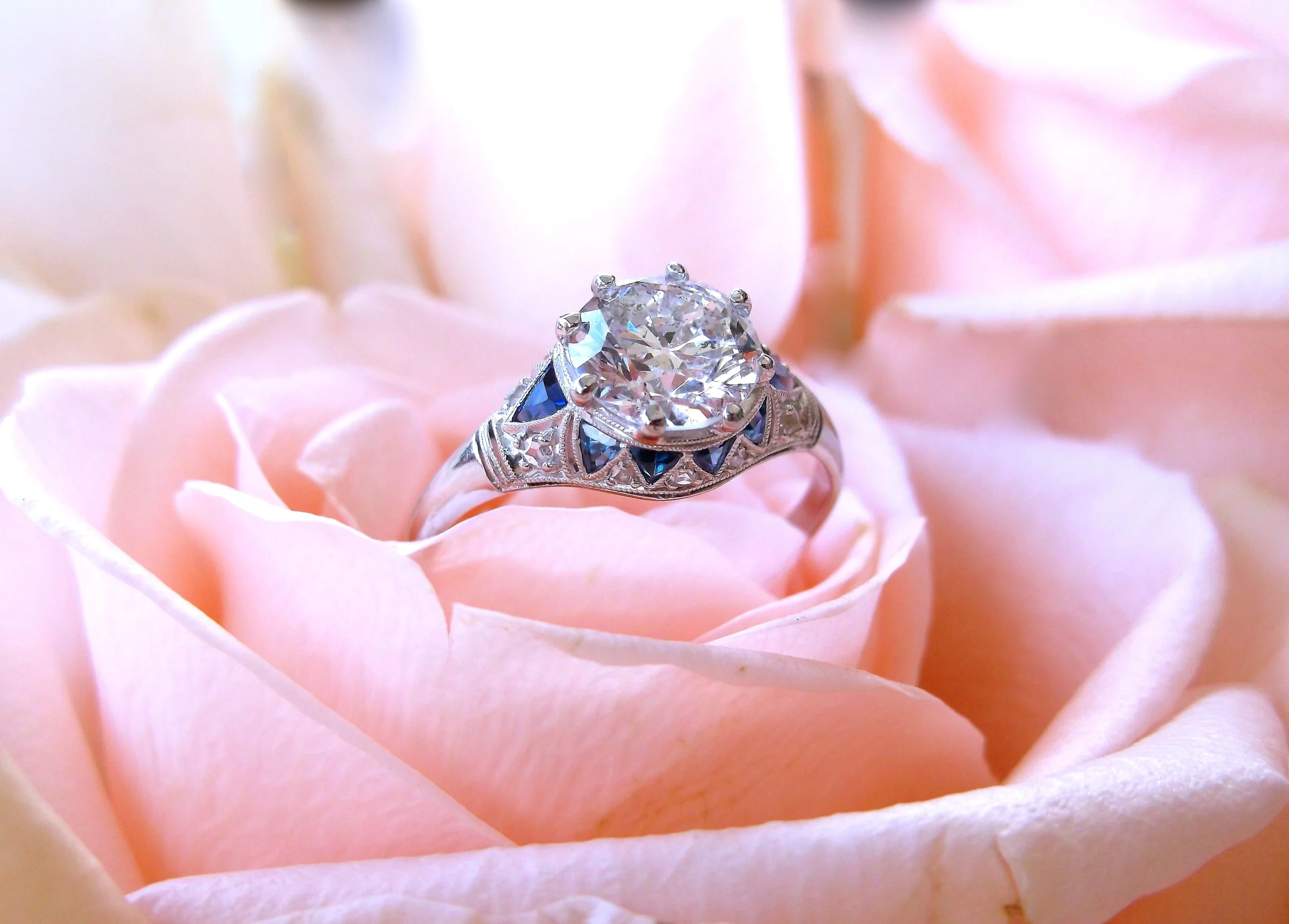 SOLD - Beautiful 1920's 1.53 carat Old European cut diamond set in a platinum, diamond and sapphire detail mounting. 