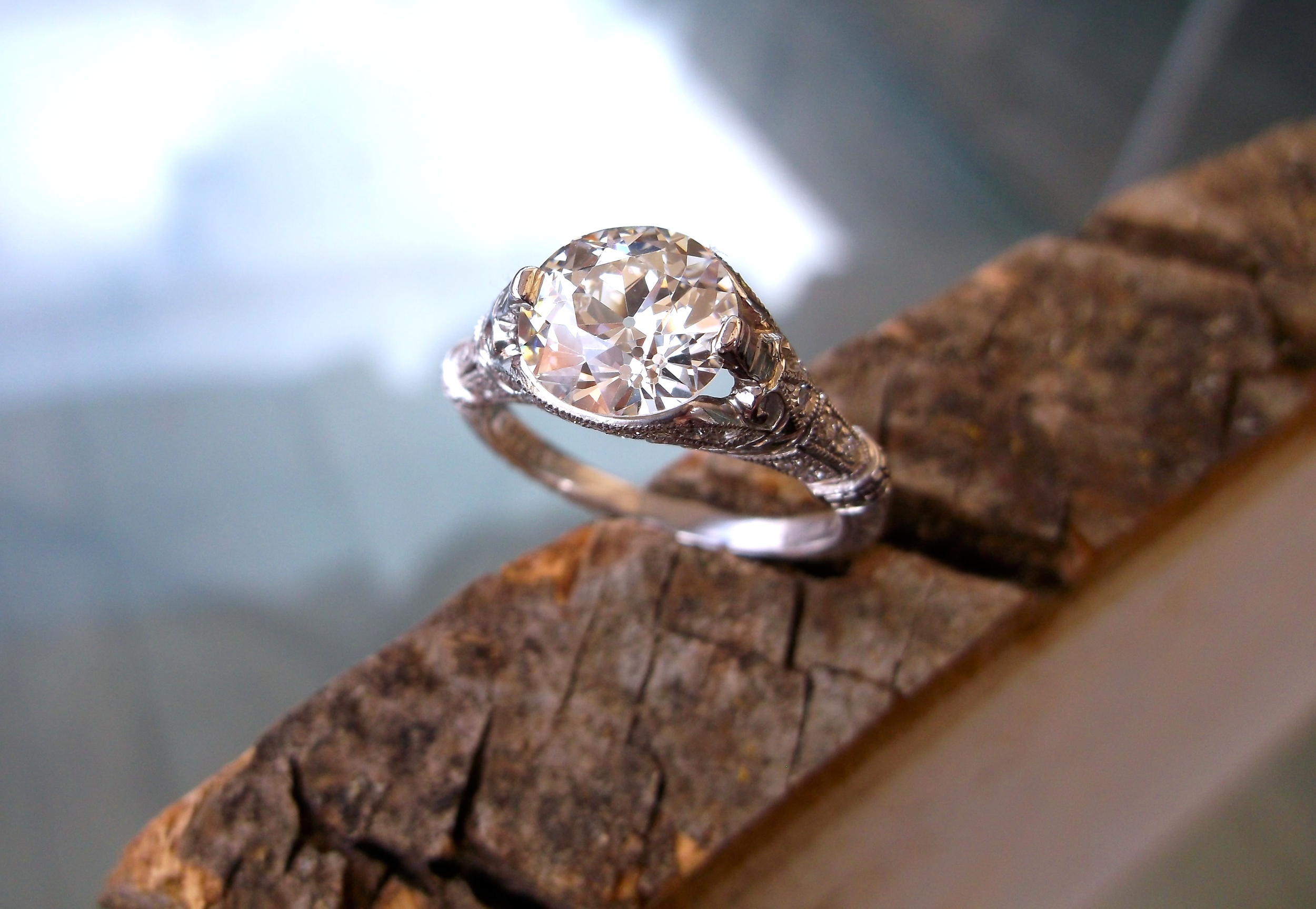 SOLD - Gorgeous all original 1920's 2.16 carat Old European cut diamond set in a lovely diamond and filigree platinum mounting. 