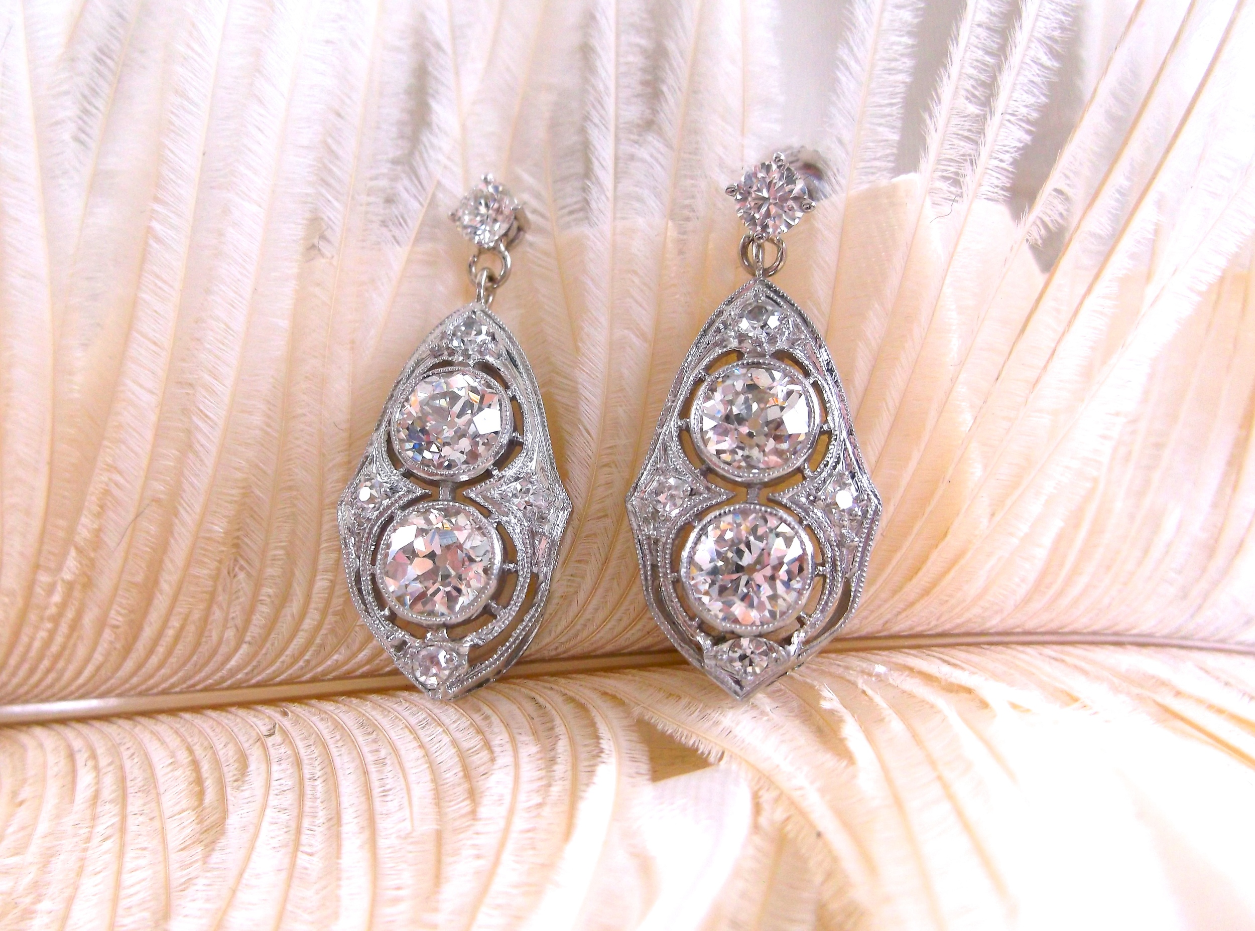 SOLD - Absolutely stunning Art Deco diamond earrings with 3.25 carats total weight in Old European cut diamonds. 