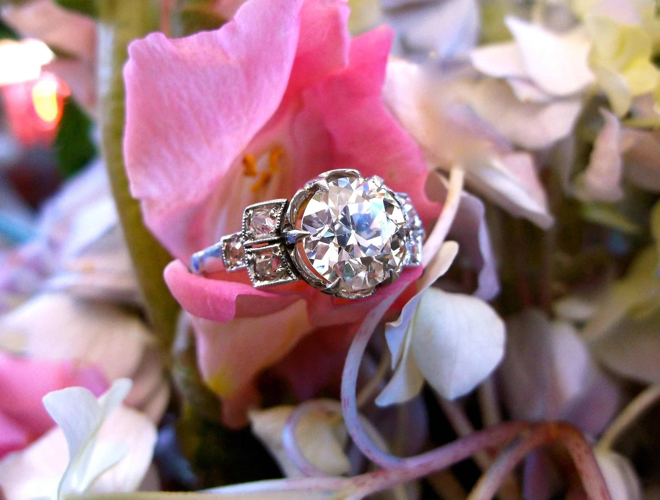SOLD - Lovely Art Deco 2.00 carat Old European cut diamond ring set in a beautiful platinum and diamond mounting. 