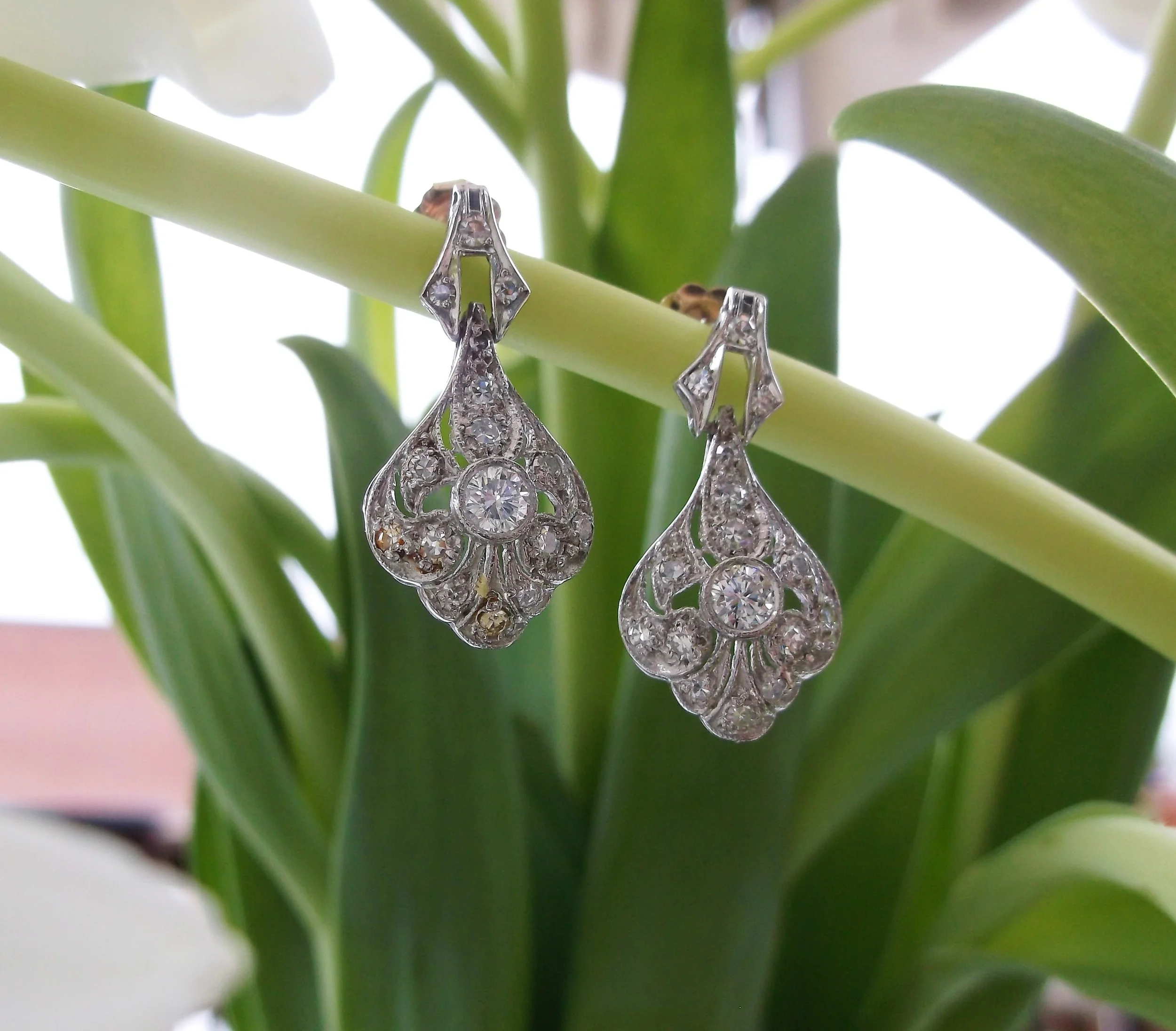 SOLD - Lovely diamond and platinum slight drop earrings with 1.00 carats total weight in diamonds.
