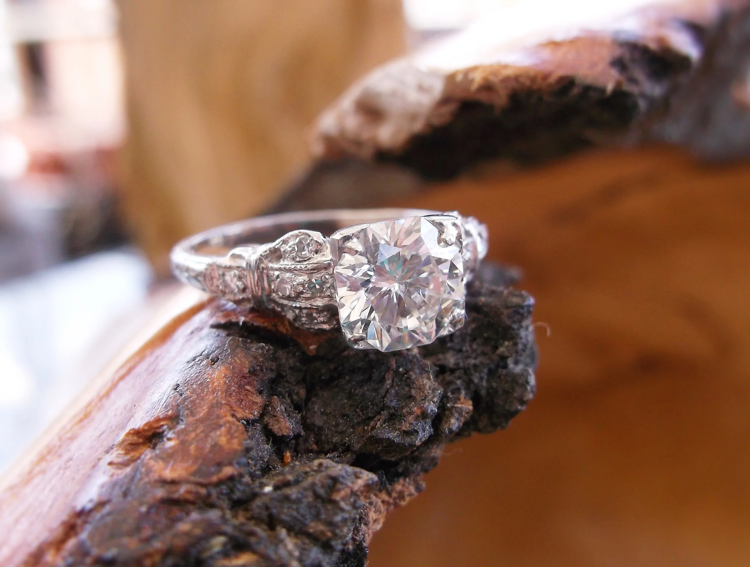 SOLD - Swoon worthy 1.32 carat center diamond in a platinum and diamond detail mounting. 