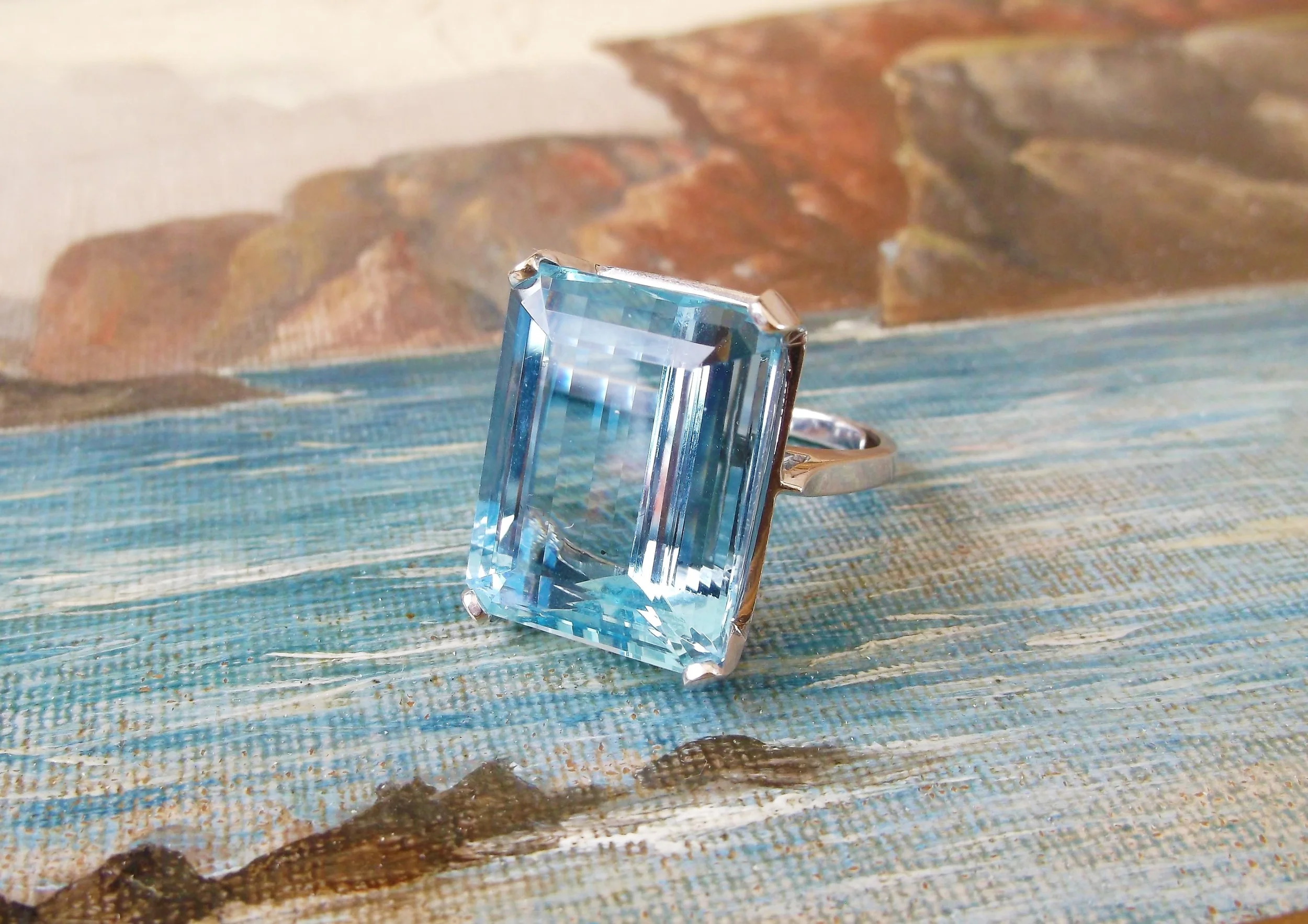SOLD - Beautiful 24.62 carat aquamarine set in a simple 18K white gold setting. 