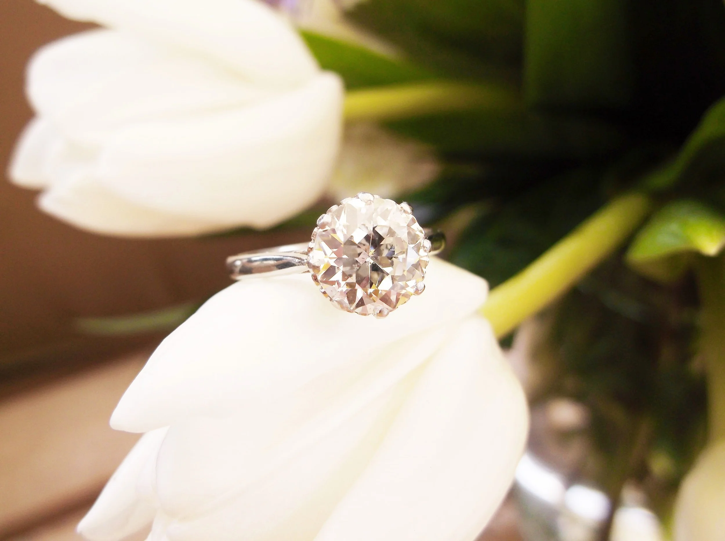 SOLD - Timeless Art Deco 2.11 carat Old European cut diamond set in an eight prong platinum mounting.