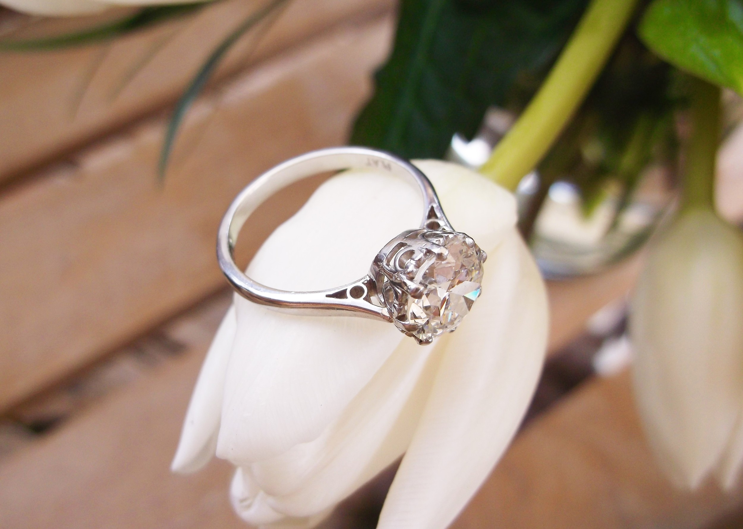 SOLD - Side view: Timeless Art Deco 2.11 carat Old European cut diamond set in an eight prong platinum mounting.