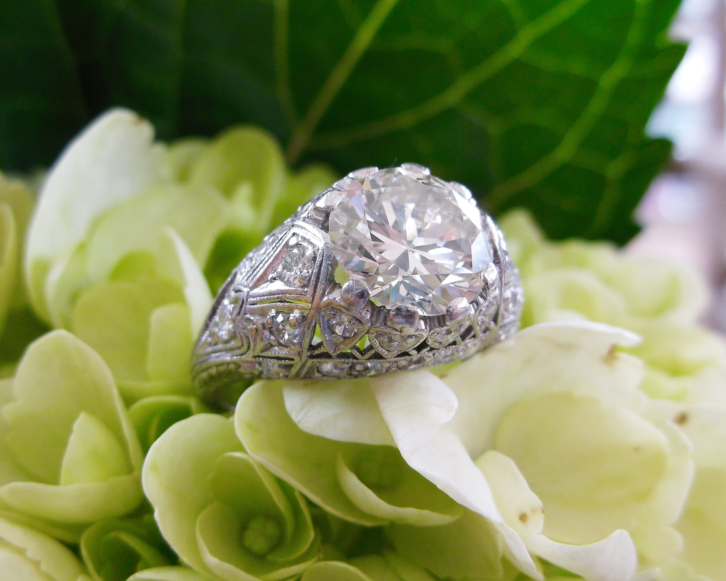 Stunning 1920's 2.40 carat Old European cut diamond in a beautiful diamond and platinum mounting.