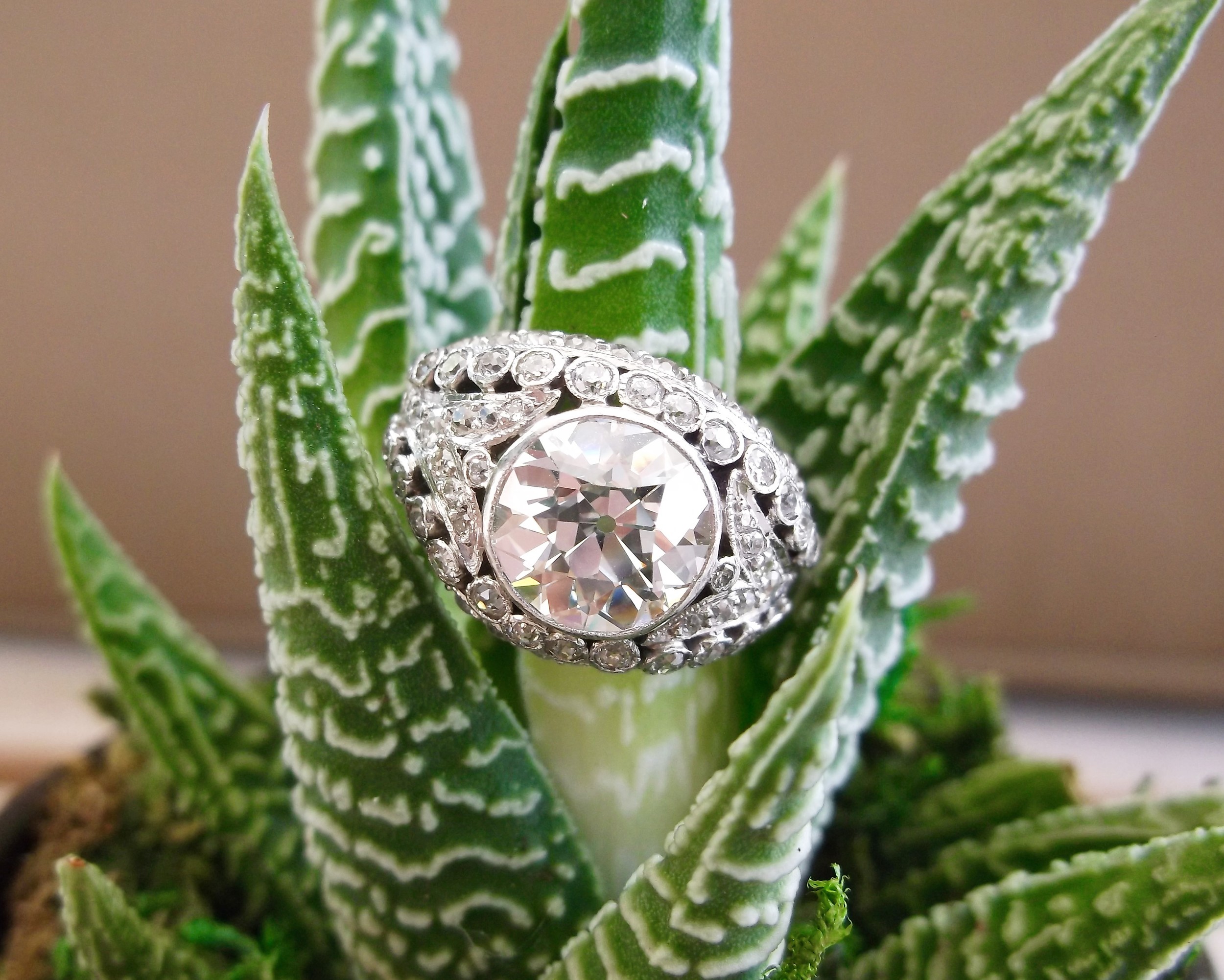 SOLD - Exquisite 2.28 carat Old European cut diamond in a beautiful platinum and diamond detail mounting.