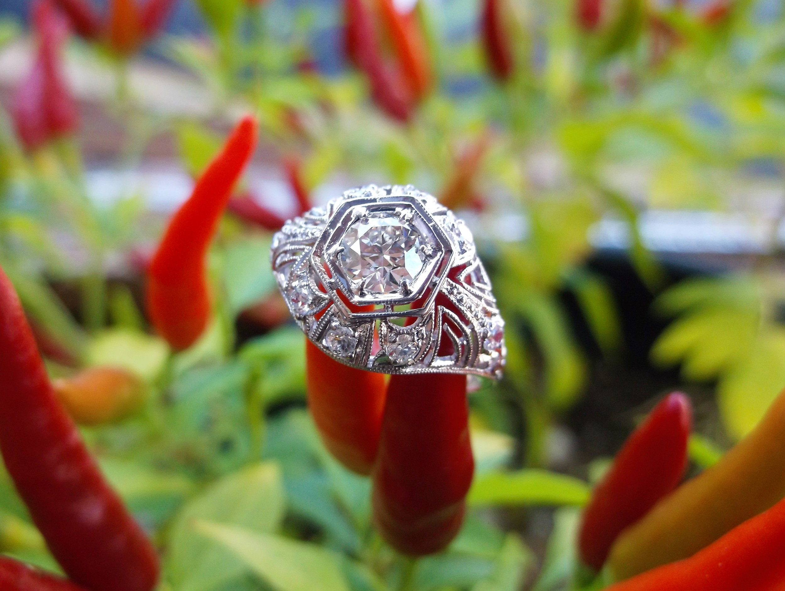 SOLD - Beautiful 1920's 0.47 carat Old European cut diamond set in a platinum and diamond detail mounting.