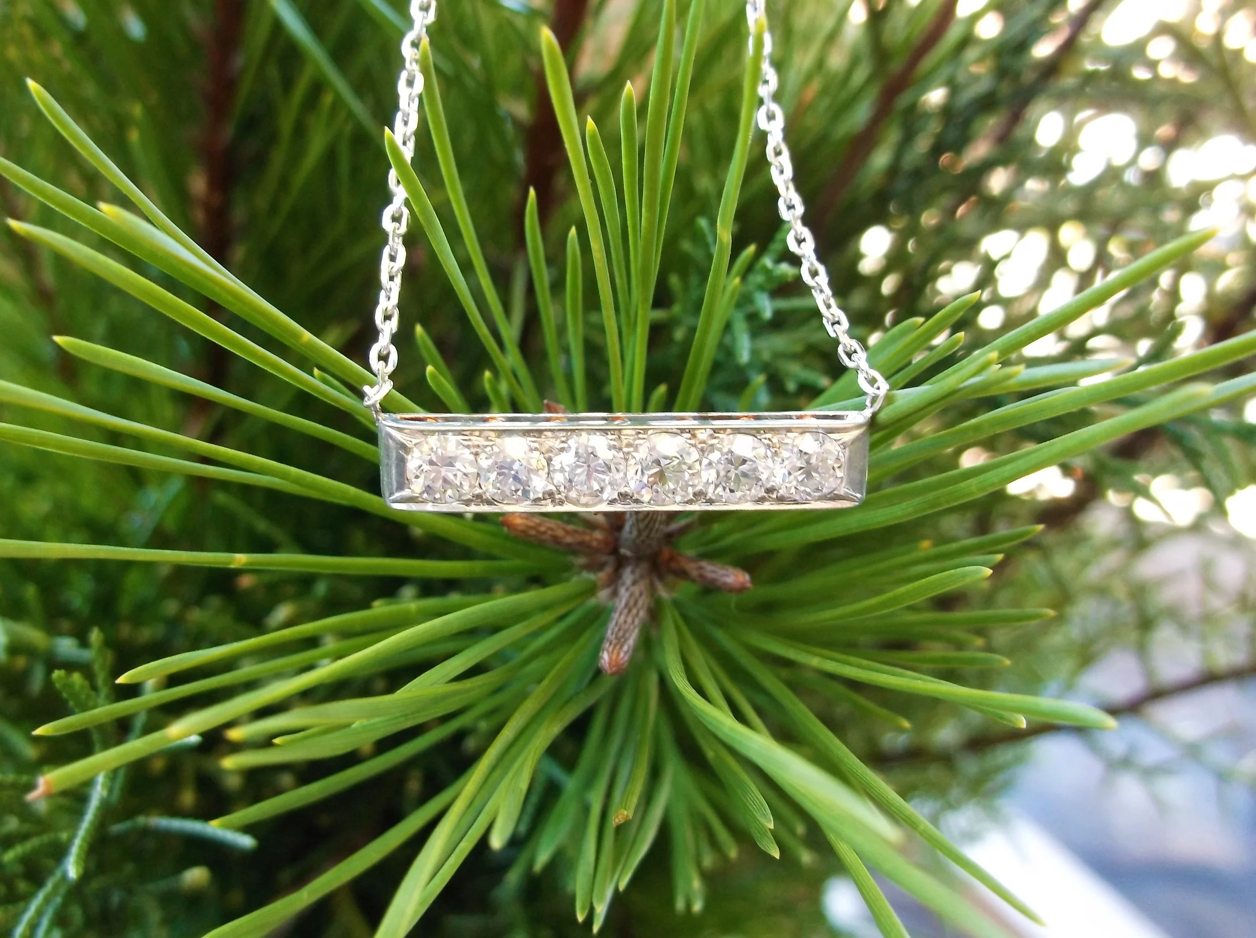 SOLD - Lovely Old Mine cut diamond bar necklace with 1.50 carats total weight in diamonds set in platinum topped gold.