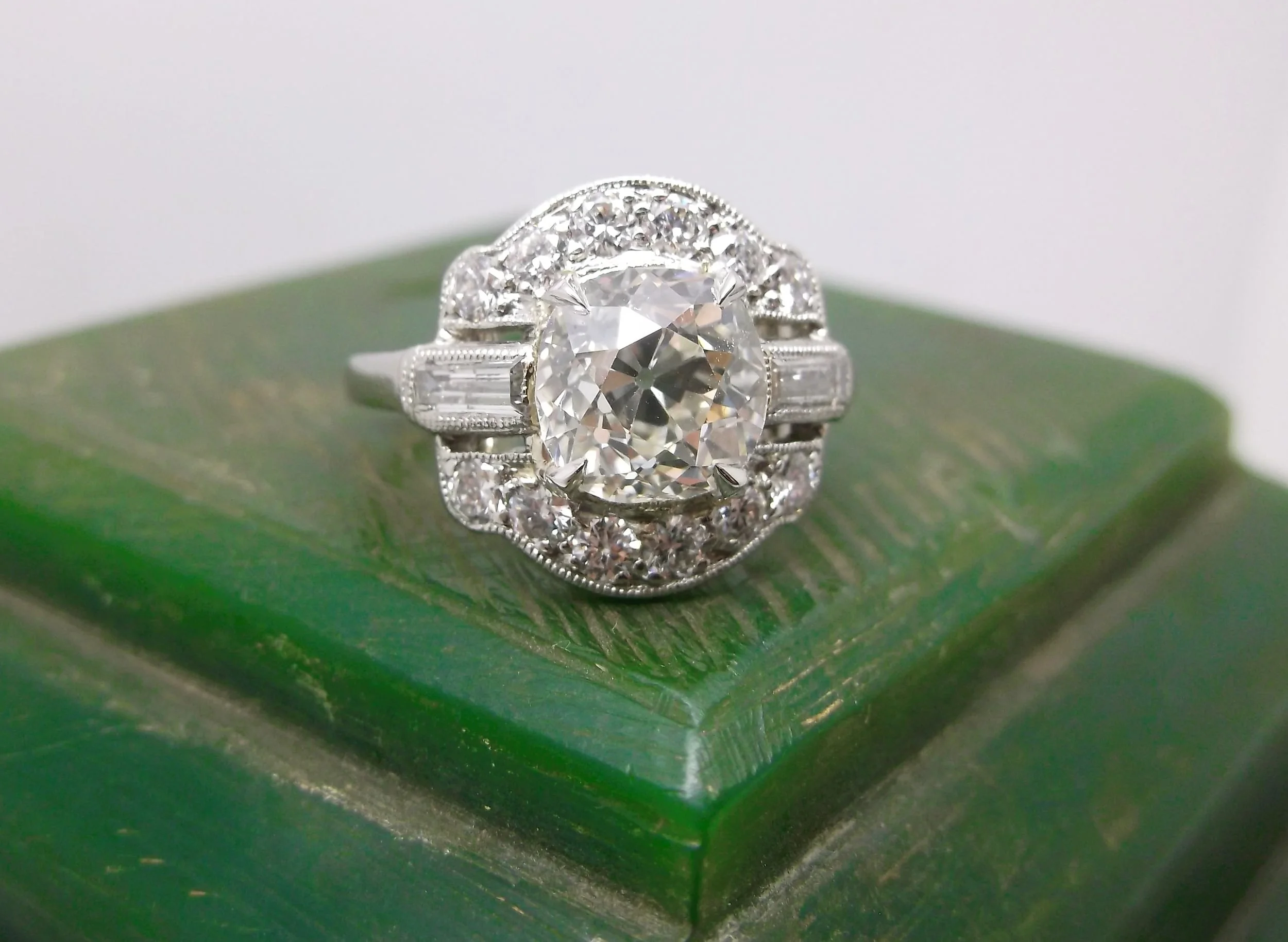 SOLD - Gorgeous 1920's 1.60 carat Old Mine cut diamond set in a beautfiul platinum and diamond mounting.