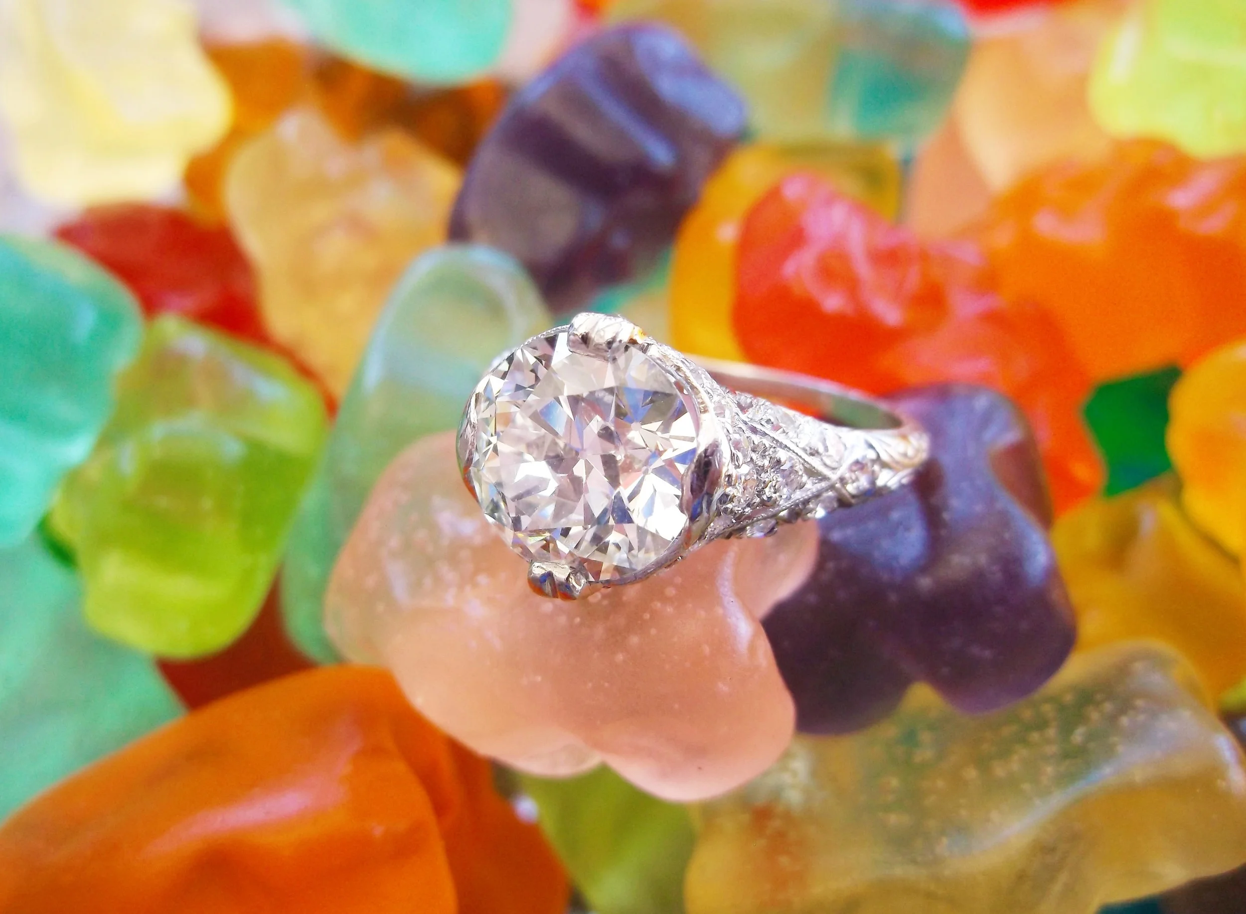 Delicious 1920's 2.99 carat Old European cut diamond set in a stunning diamond and platinum mounting.