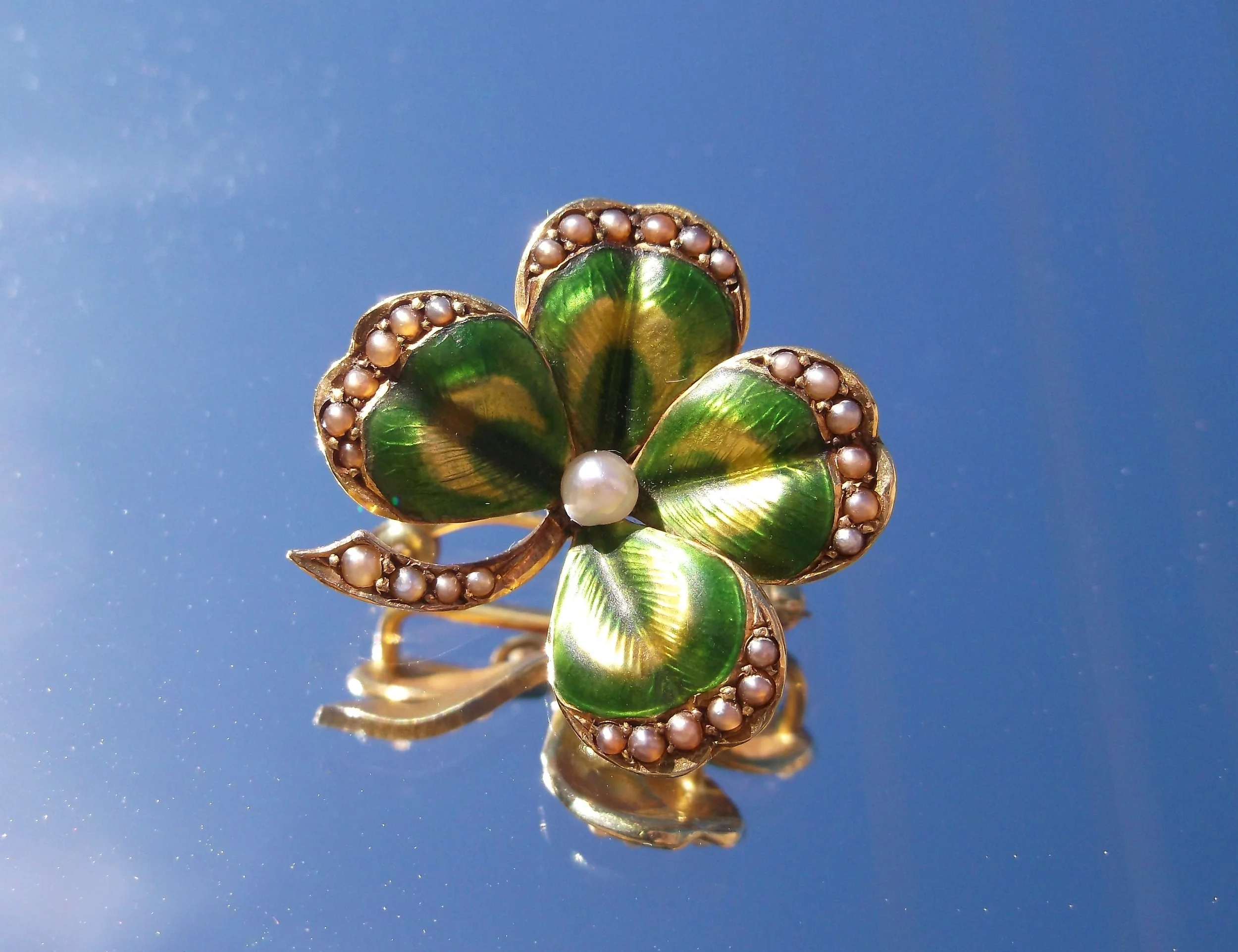 SOLD - Lucky turn of the century yellow gold, pearl and green enameling clover pin.