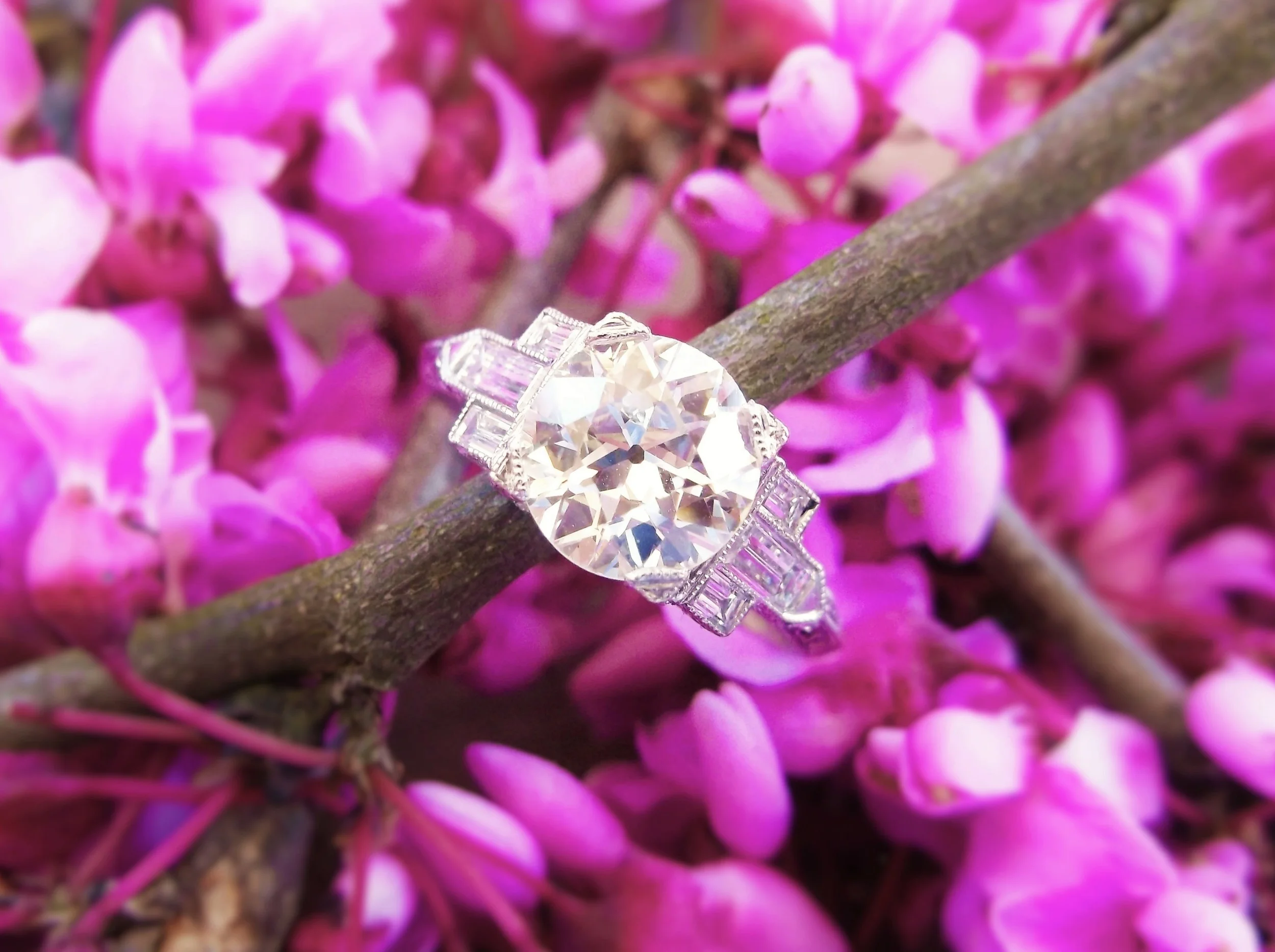 SOLD - Stunning 1.63 carat Old European cut diamond set in a beatiful baguette diamond and platinum mounting.