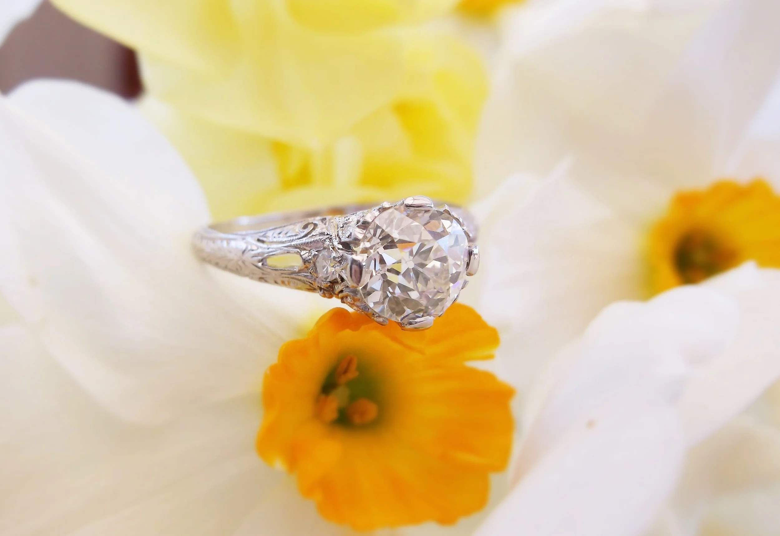 SOLD - Sophisticated 1920's 1.32 carat Old European cut diamond set in a platinum mounting with lovley diamond detail.