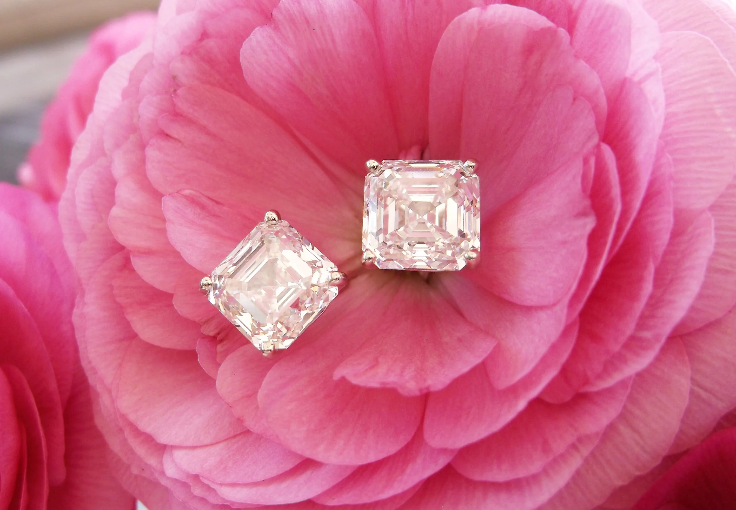 SOLD - The most perfect pair of asscher cut diamond earrings we have ever seen! 3.89 carats in one ear and 4.04 carats in the other!