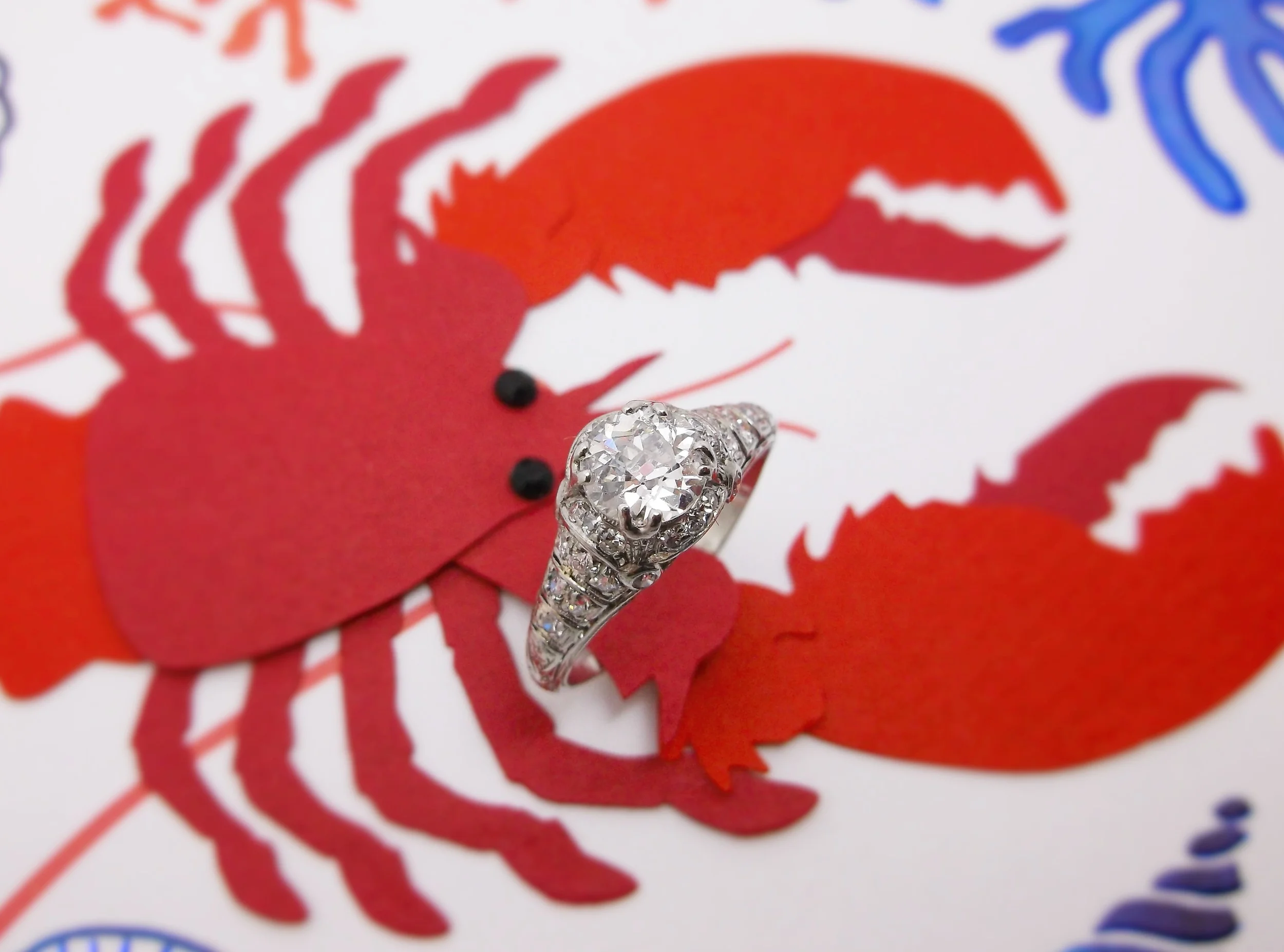 Pinch us, we must be dreaming! Gorgeous 1920's 0.85 carat Old European cut diamond set in a beautiful diamond and platinum mounting.