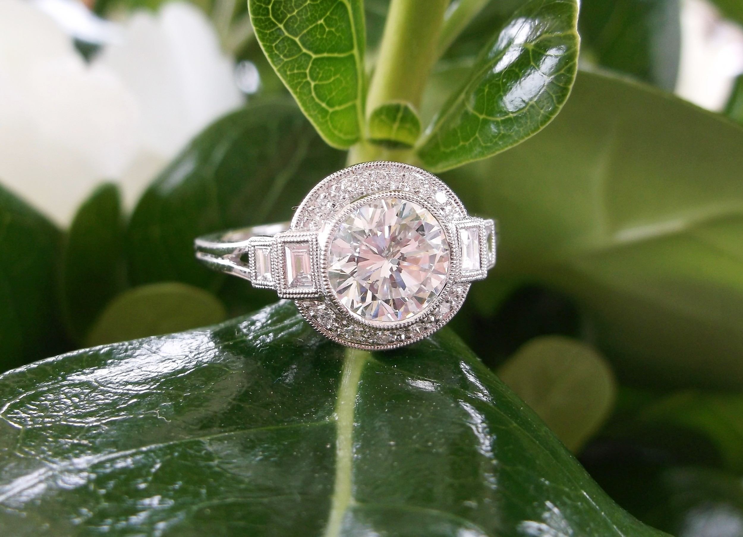 A gorgeous 1.29 carat diamond set in a beautifully crafted diamond and platinum mounting.