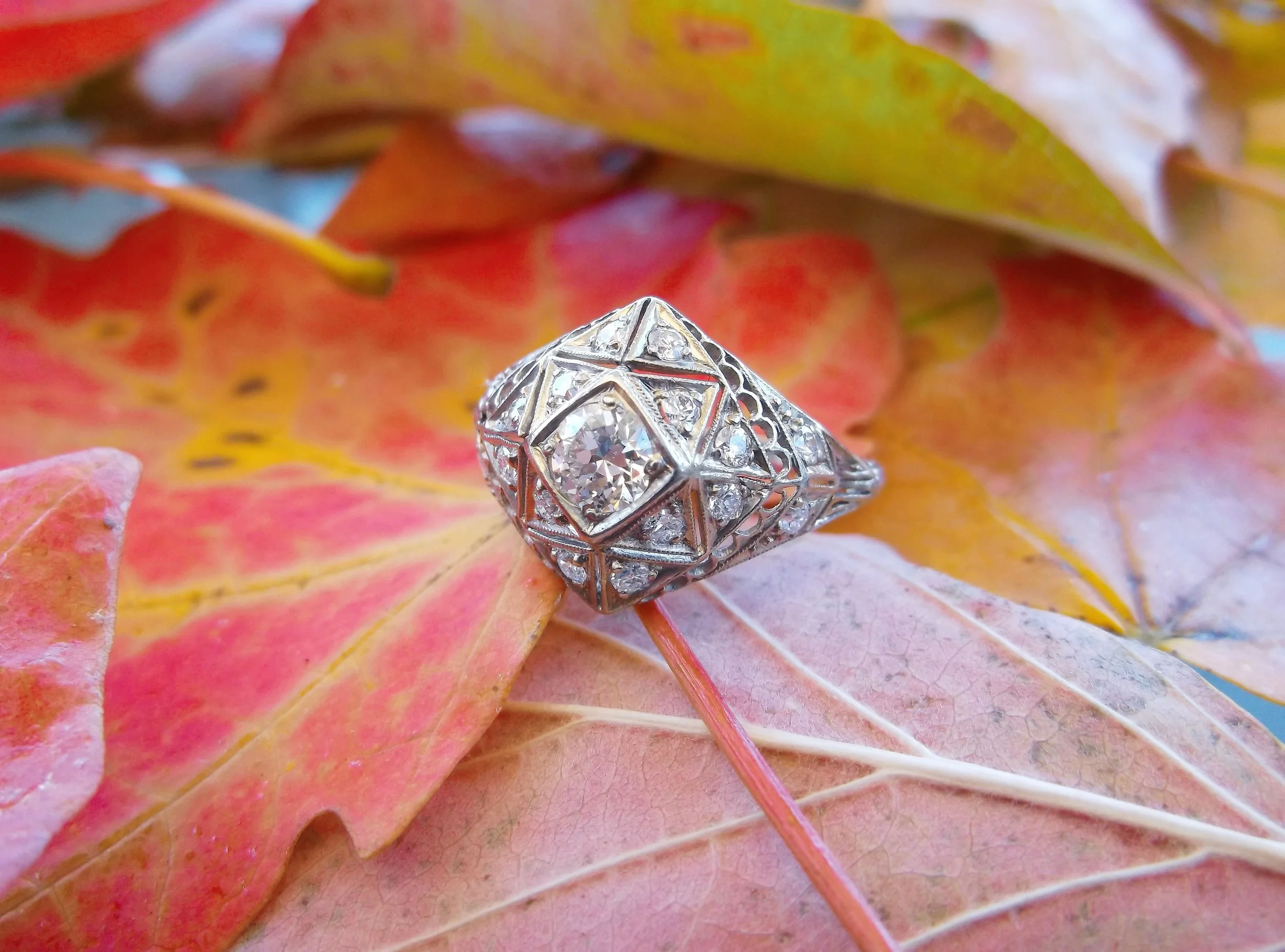 SOLD - Intricate Art Deco diamond ring, set with a 0.50 carat Old Mine cut diamond in the center.
