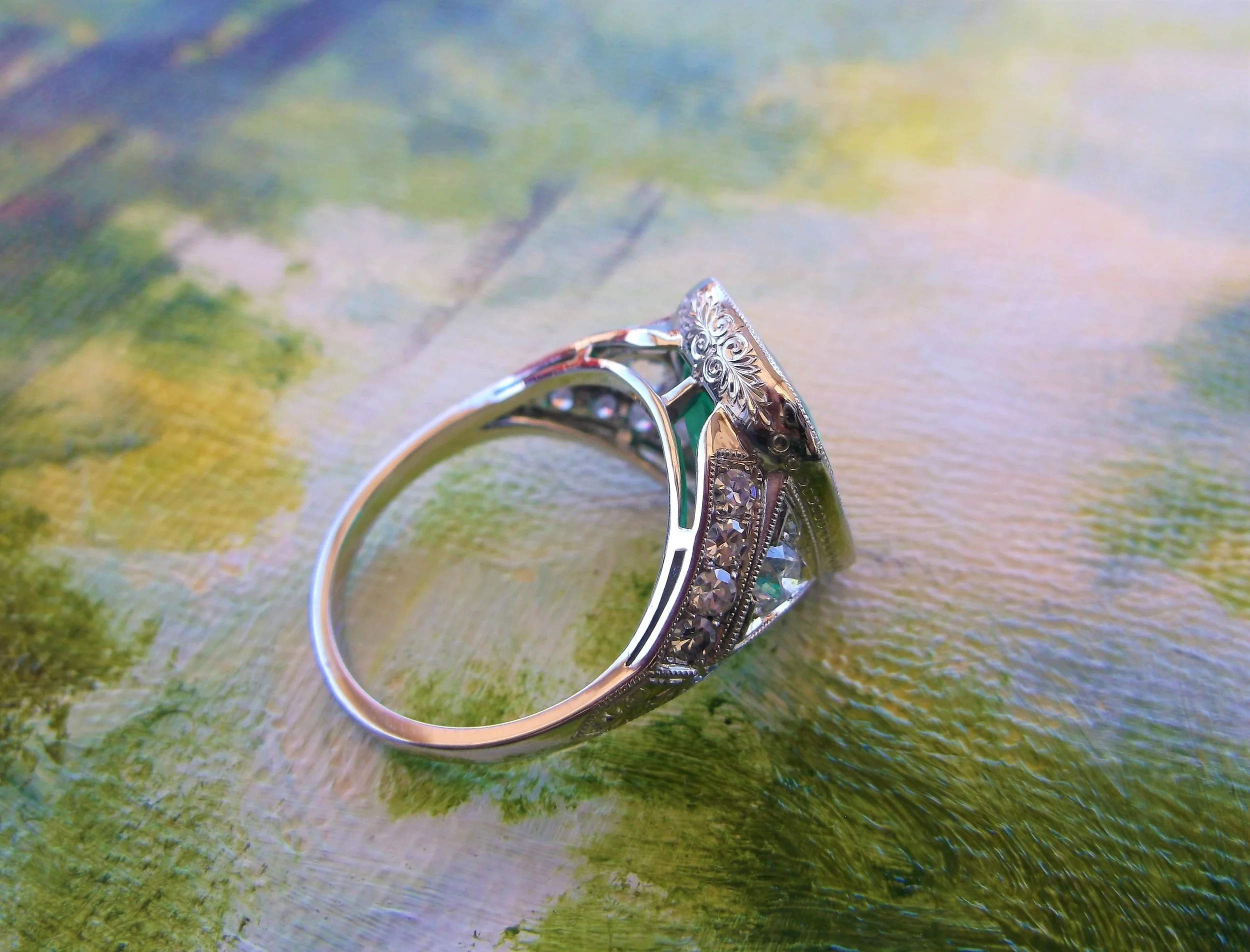 SOLD - Gorgeous side view of the 5.13 carat emerald and diamond ring. 