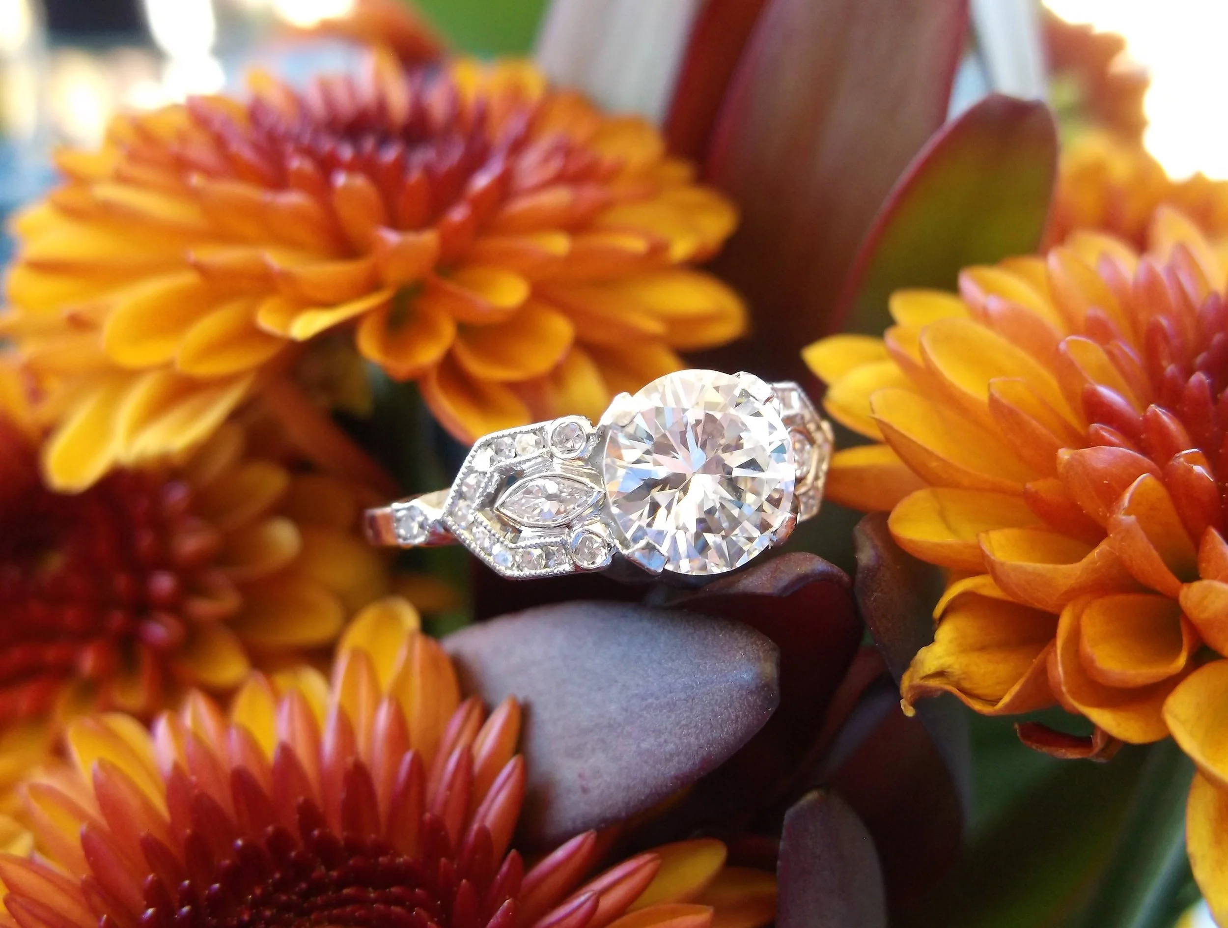 SOLD - Glamorous 1.24 carat Old European cut diamond set in a gorgeous diamond and platinum mounting. 