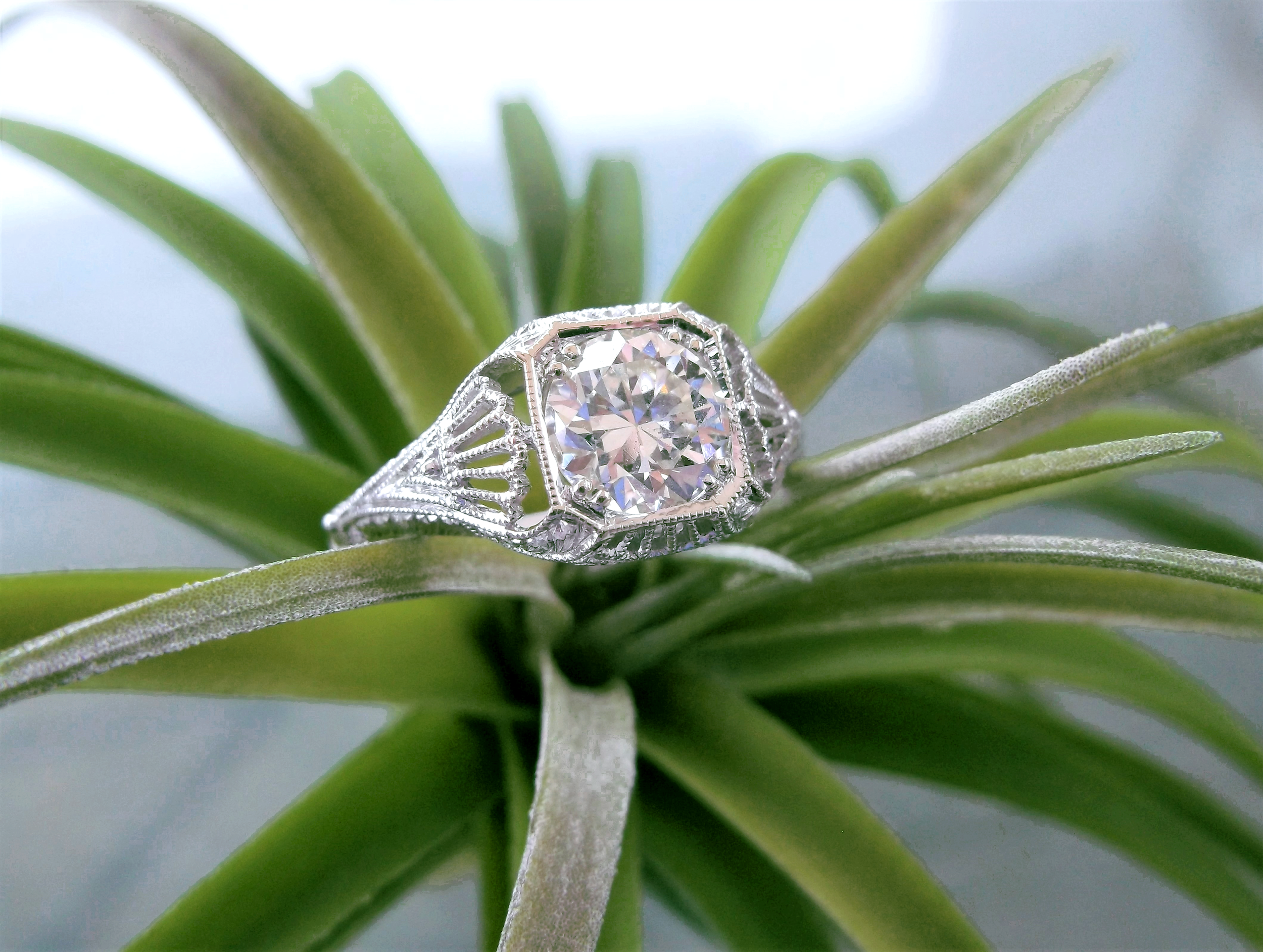 SOLD - Effortless and refined 1.20 carat Old European cut diamond set in a beautifully detailed filigree white gold mounting. 
